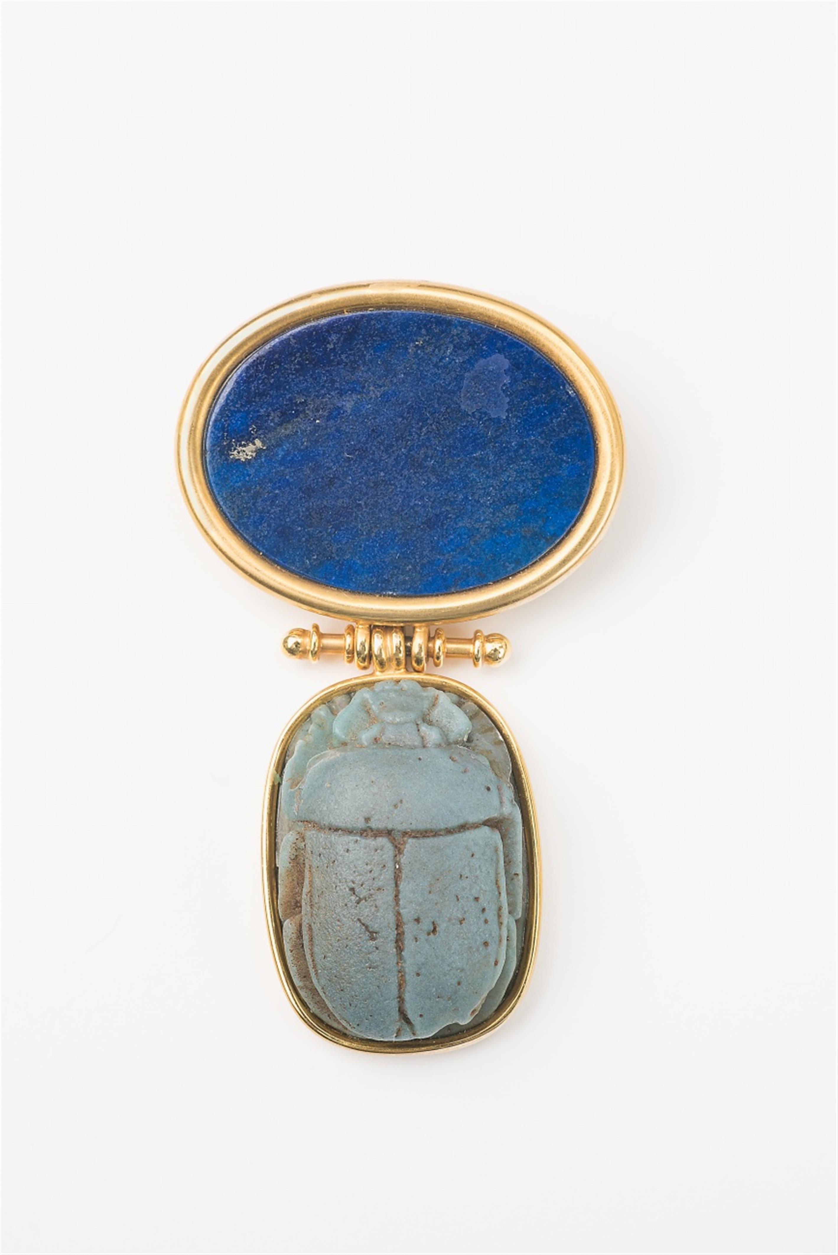 An 18k gold brooch with an Ancient Egyptian scarab amulet - image-1