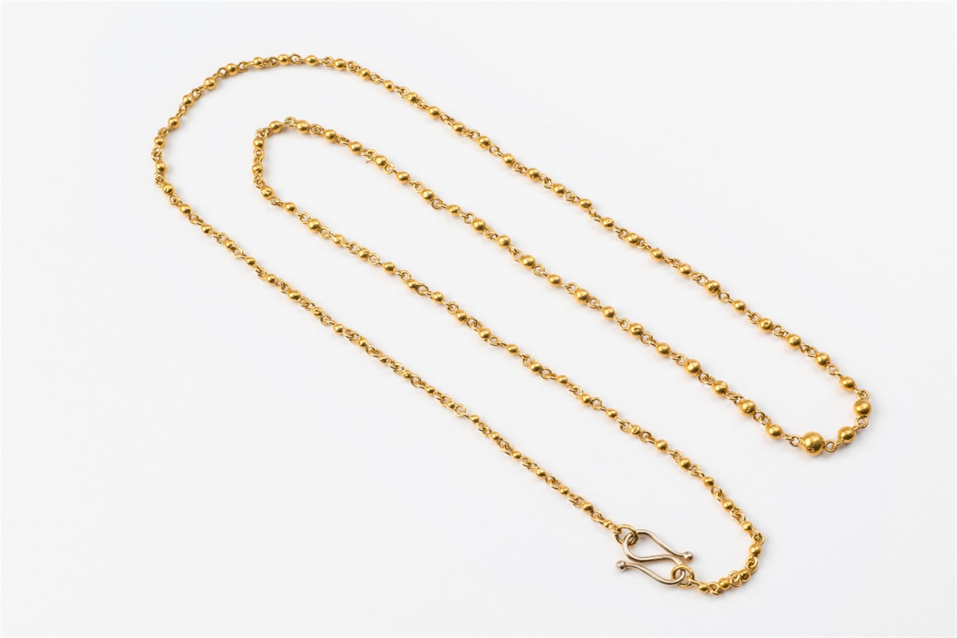 An 18k gold link necklace - image-1