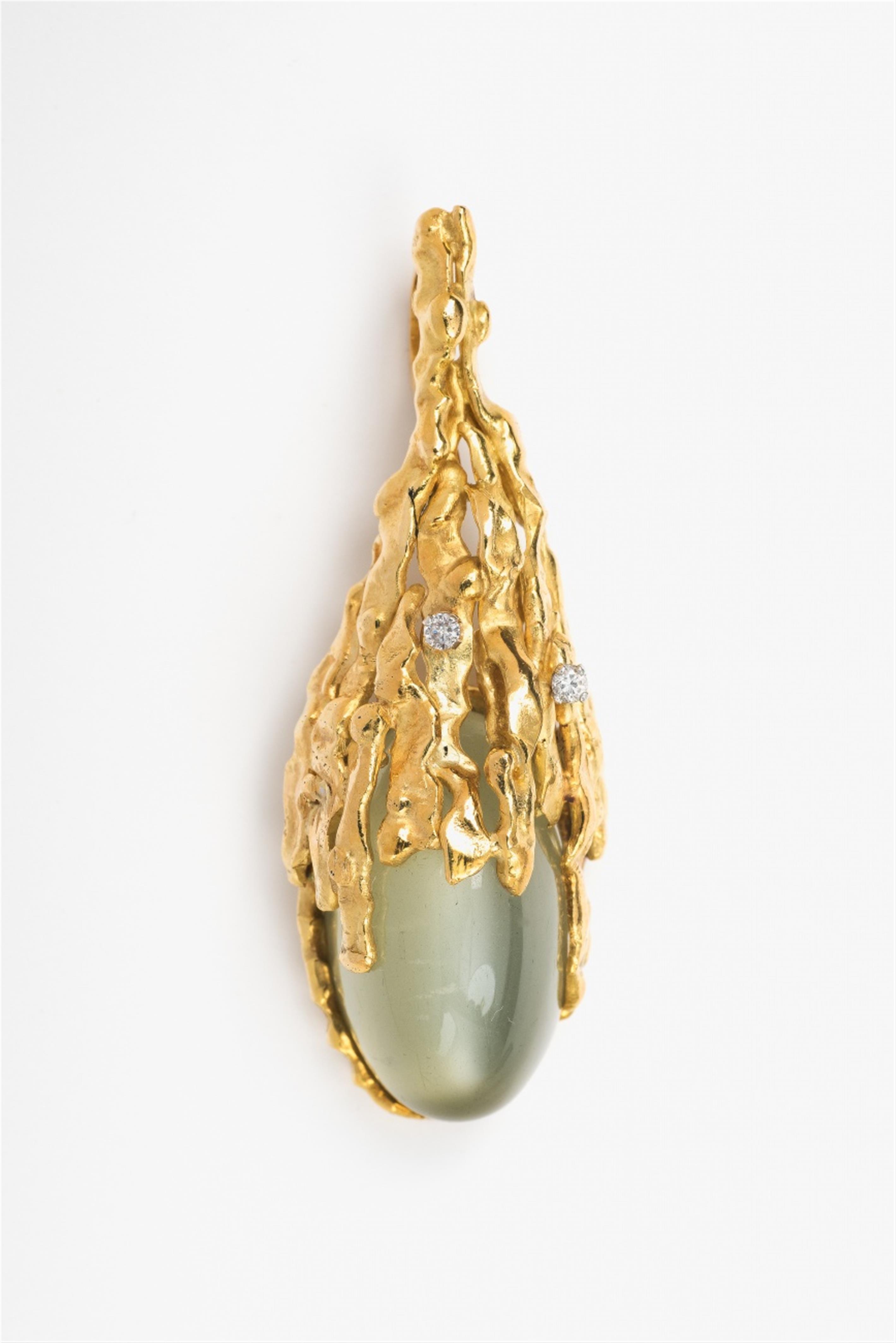 A gold and moonstone pendant - image-1