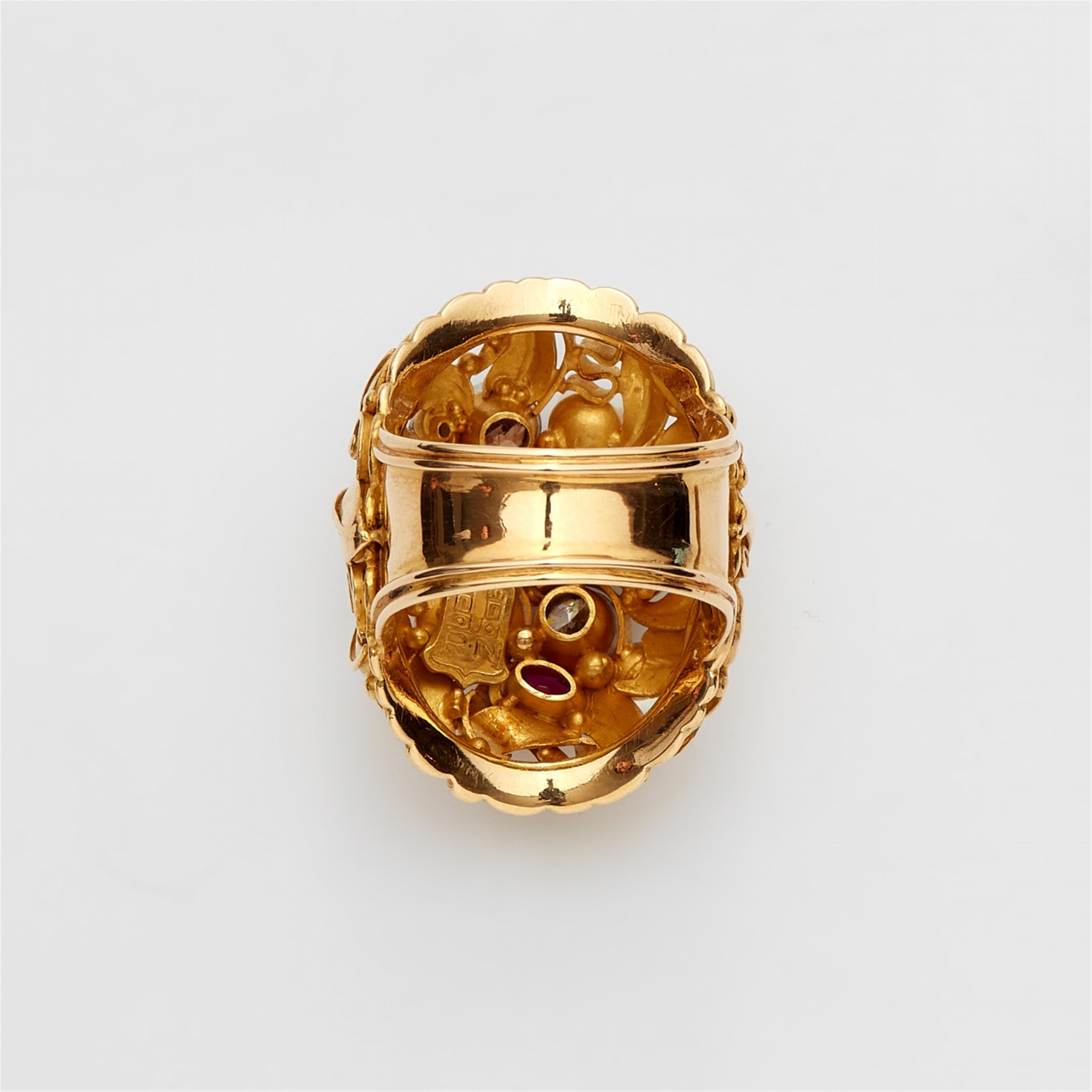 An 18k gold and gemstone ring - image-3