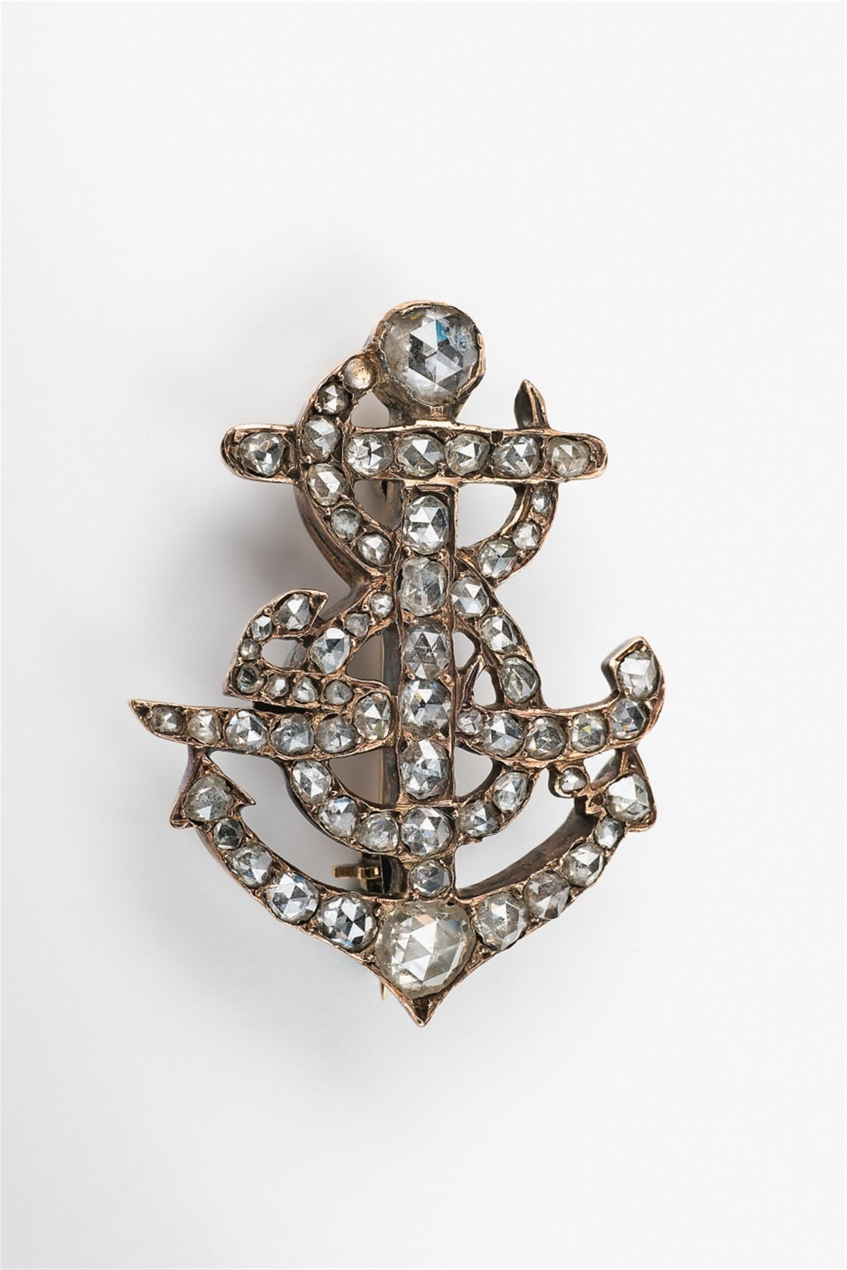 A 14k red gold and diamond anchor brooch - image-1