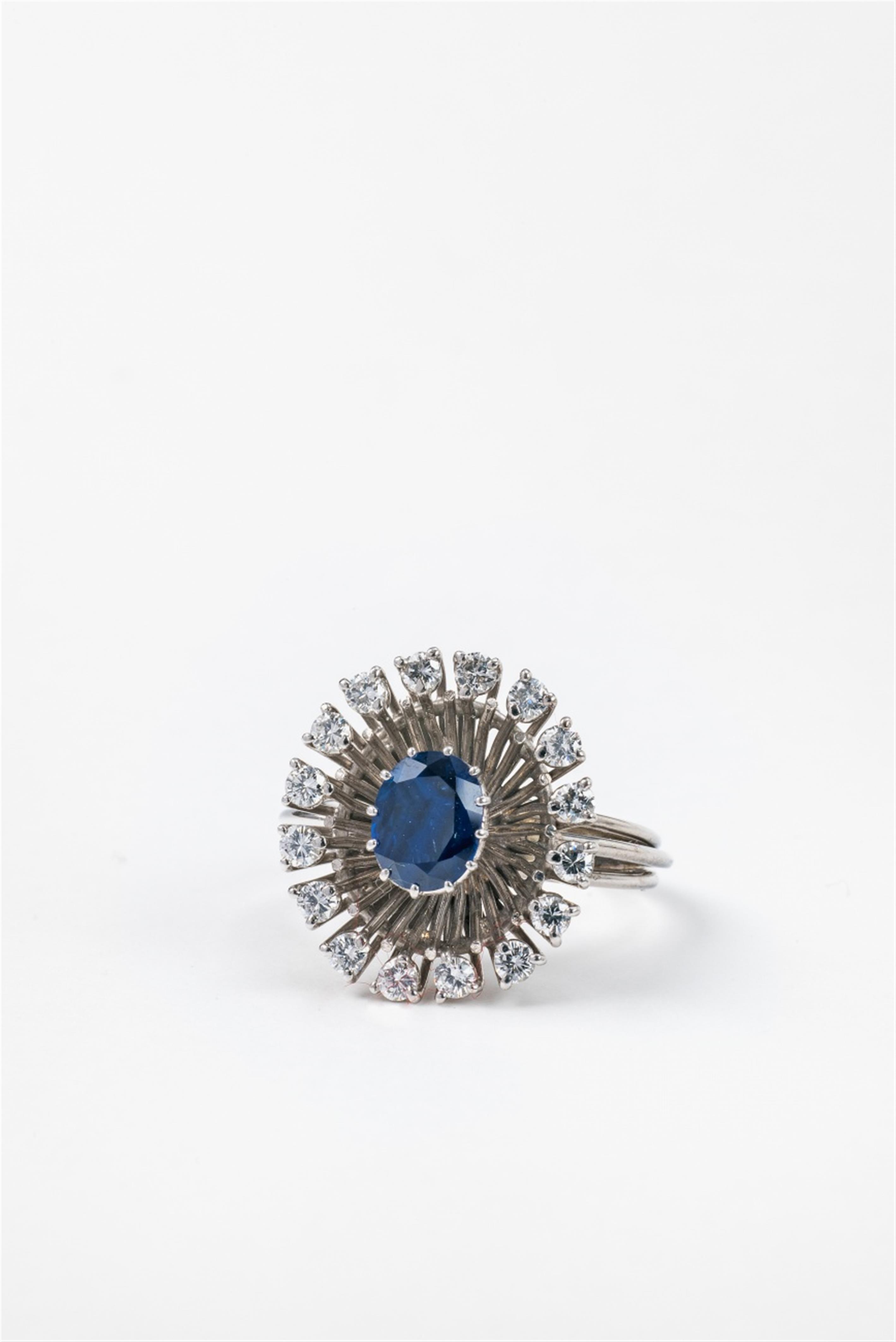An 18k white gold and sapphire ring - image-1