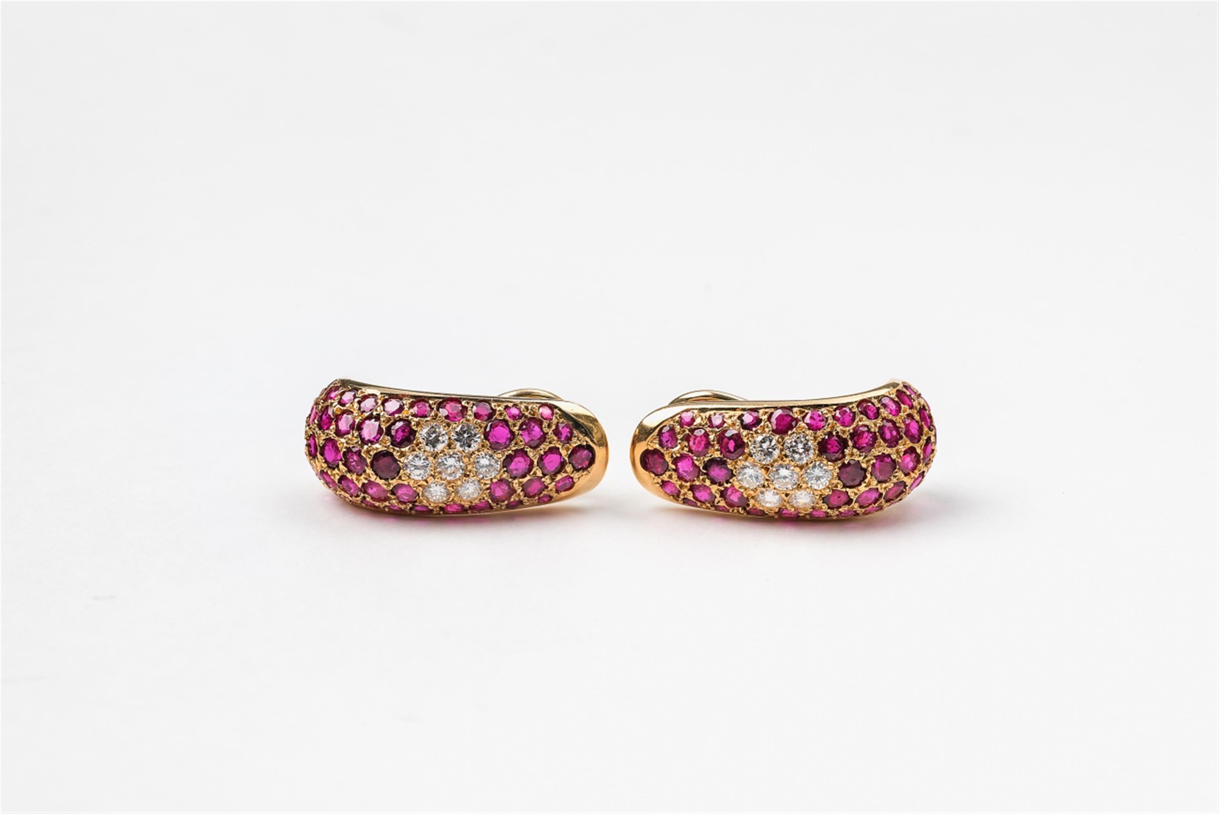 A pair of 18k gold diamond and ruby clip earrings - image-1