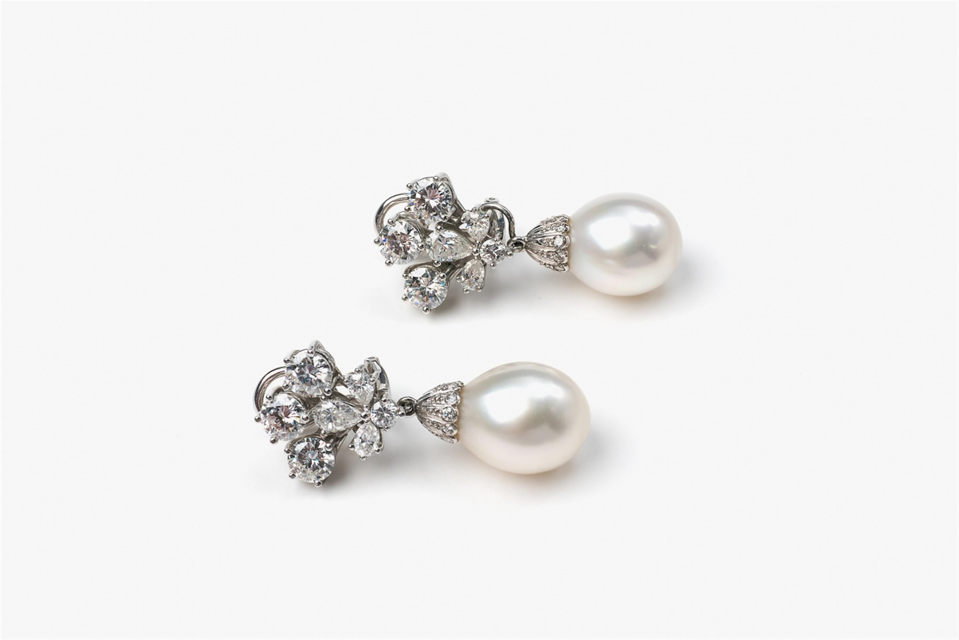 A pair of 18k white gold clip earrings with South Sea pearls - image-1