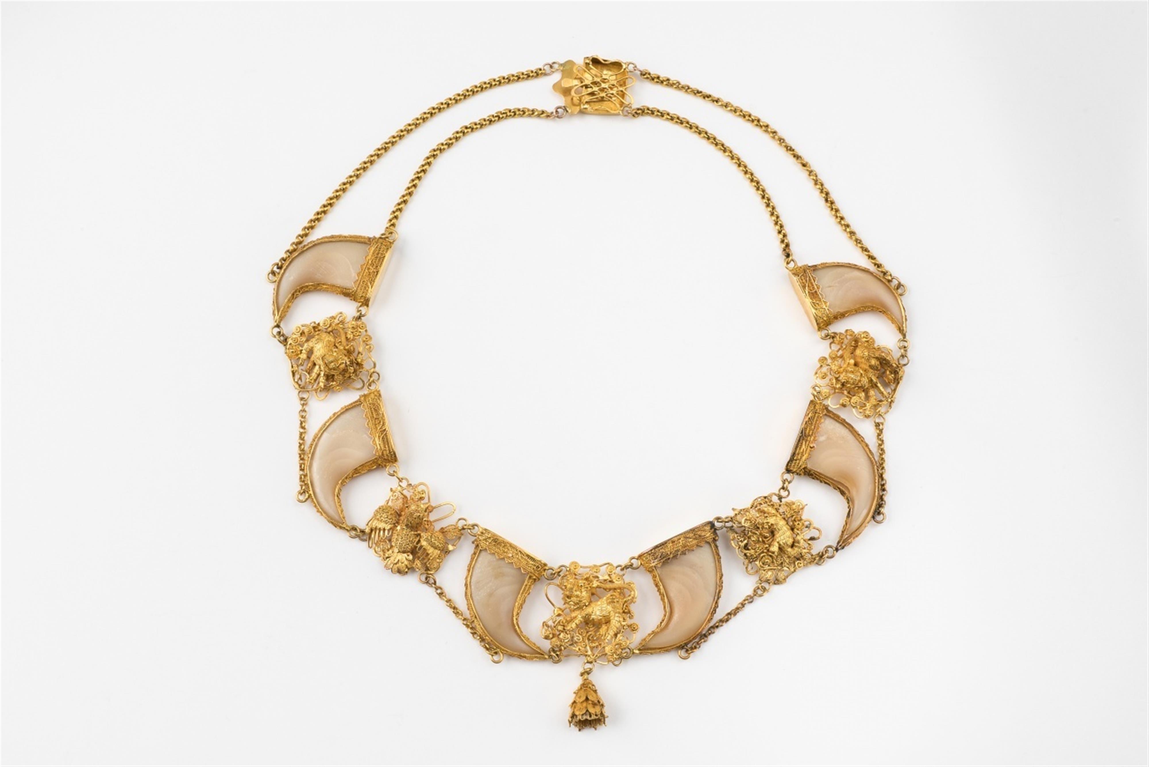 A 21k gold and tiger claw necklace - image-1