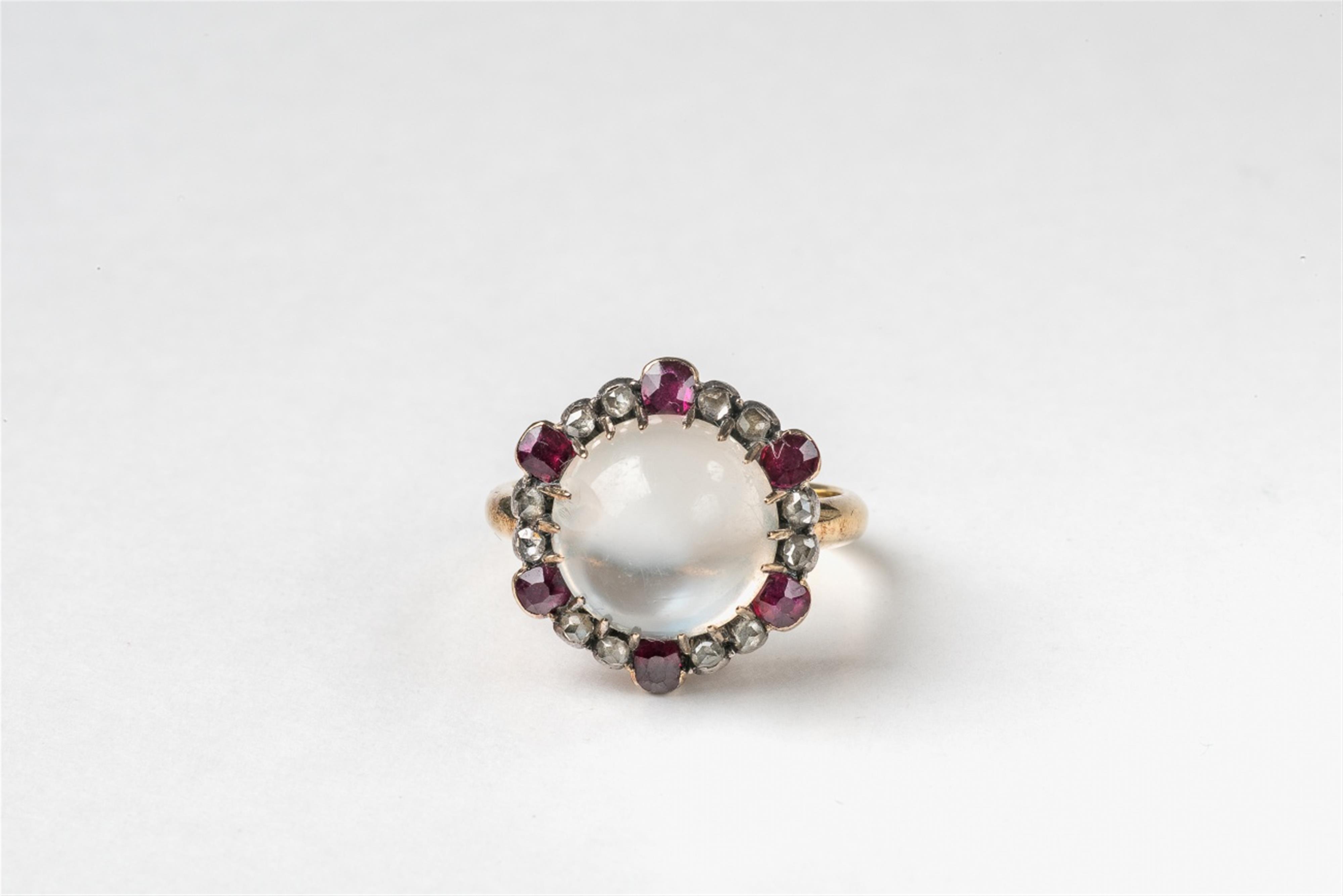 A 14k gold ruby and moonstone cluster ring - image-1