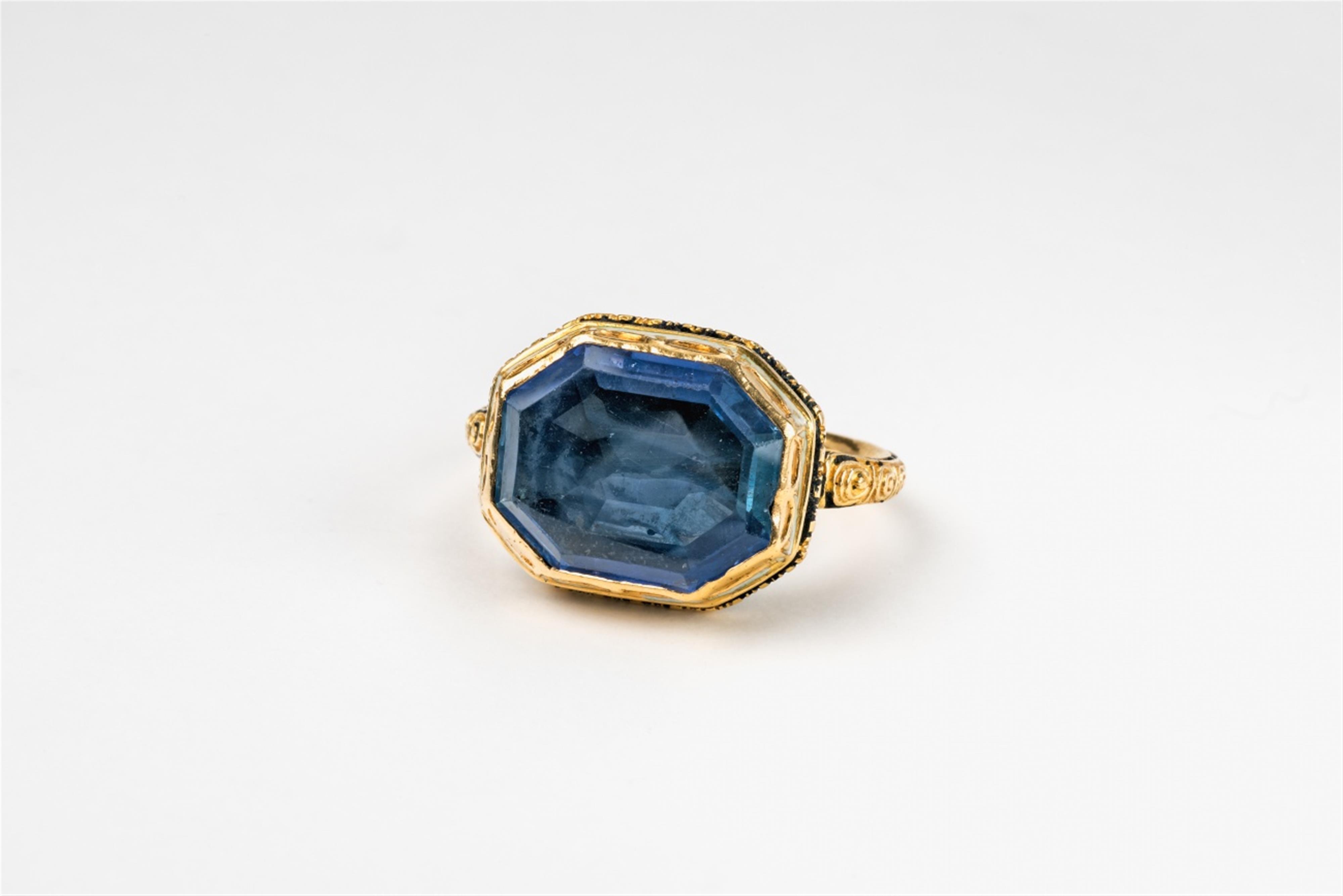 An 18k gold enamel and sapphire Renaissance Revival ring - image-1