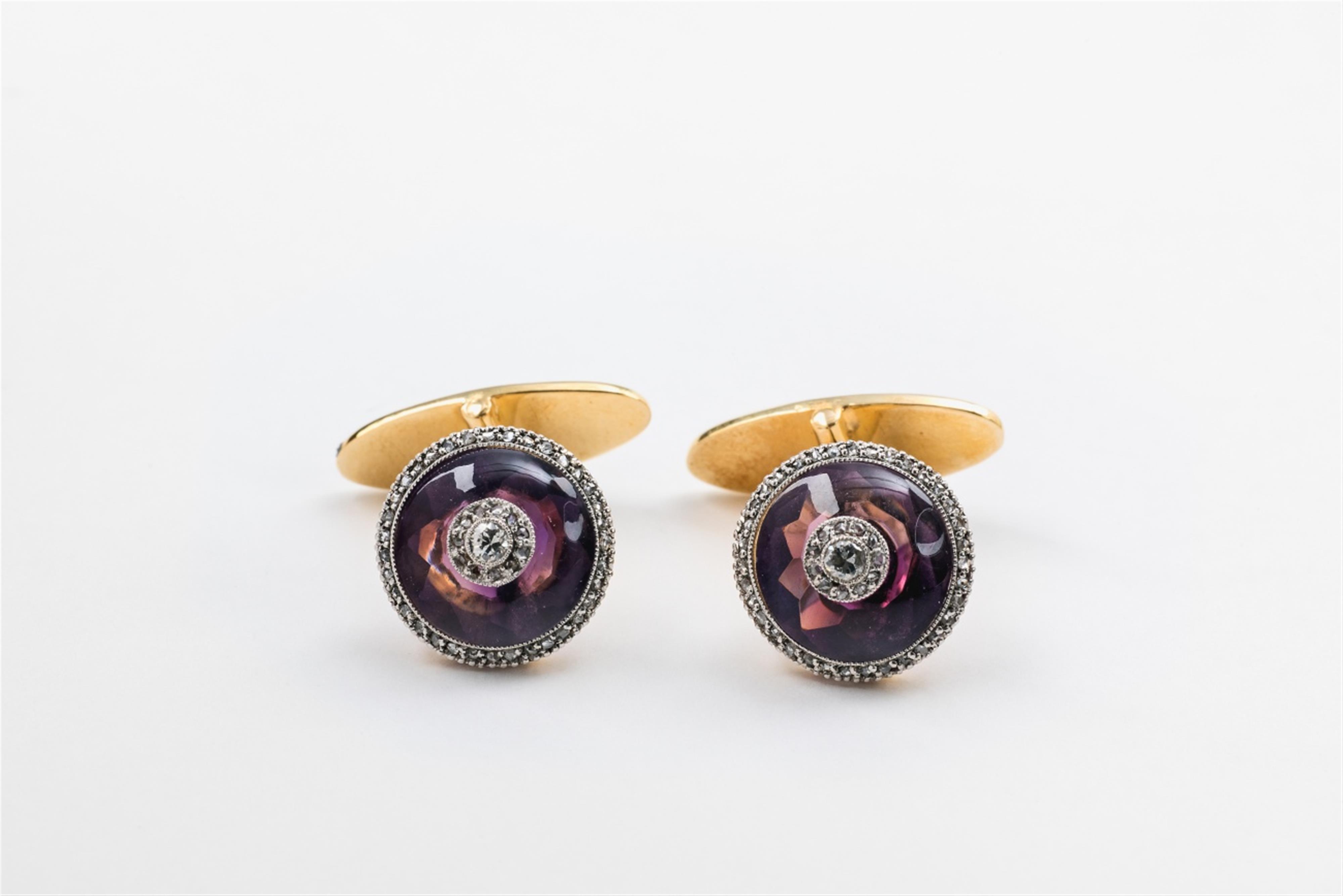 A pair of 18k gold and amethyst cufflinks - image-1