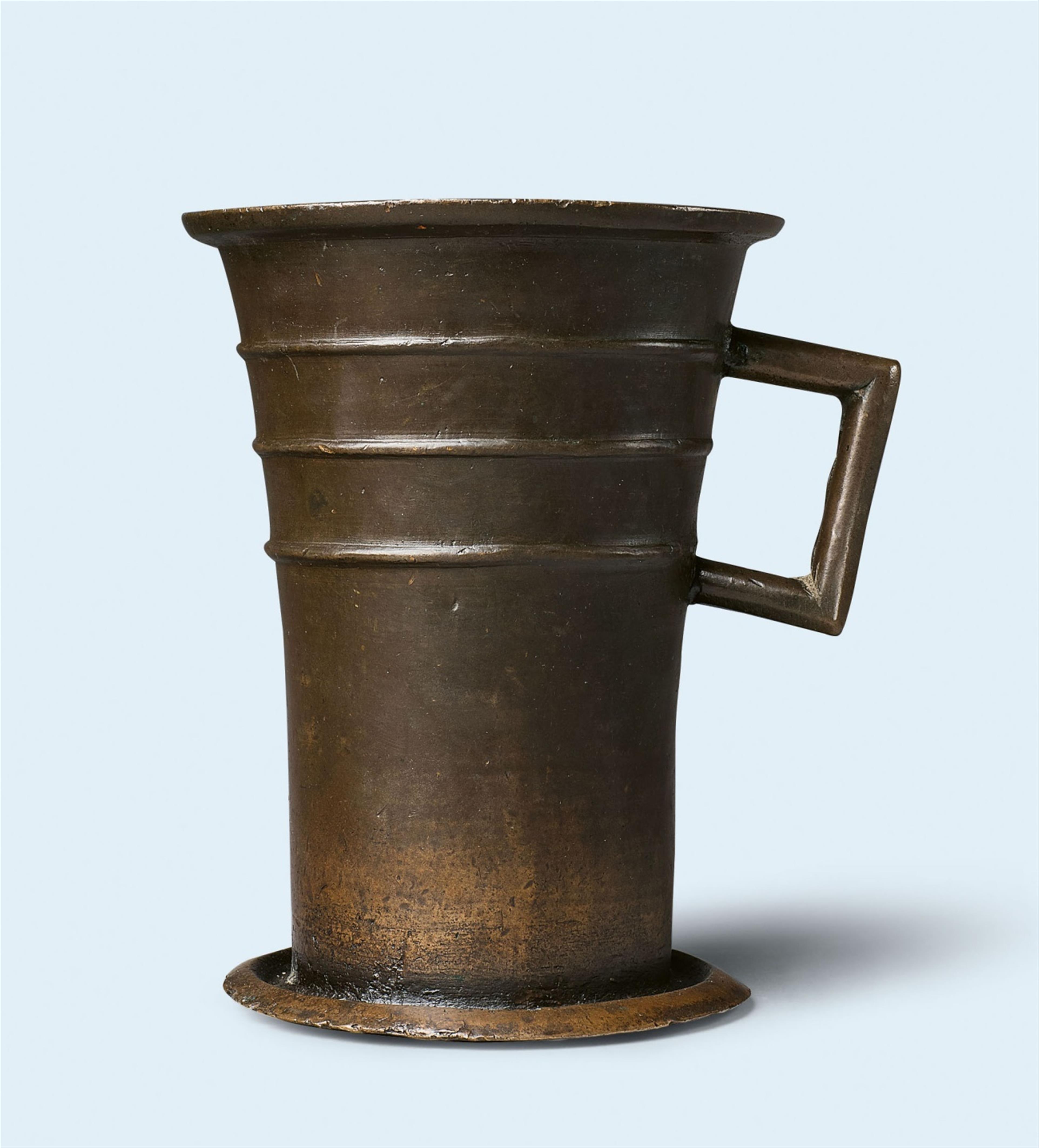 A Gothic one-handled mortar with three horizontal mouldings - image-1