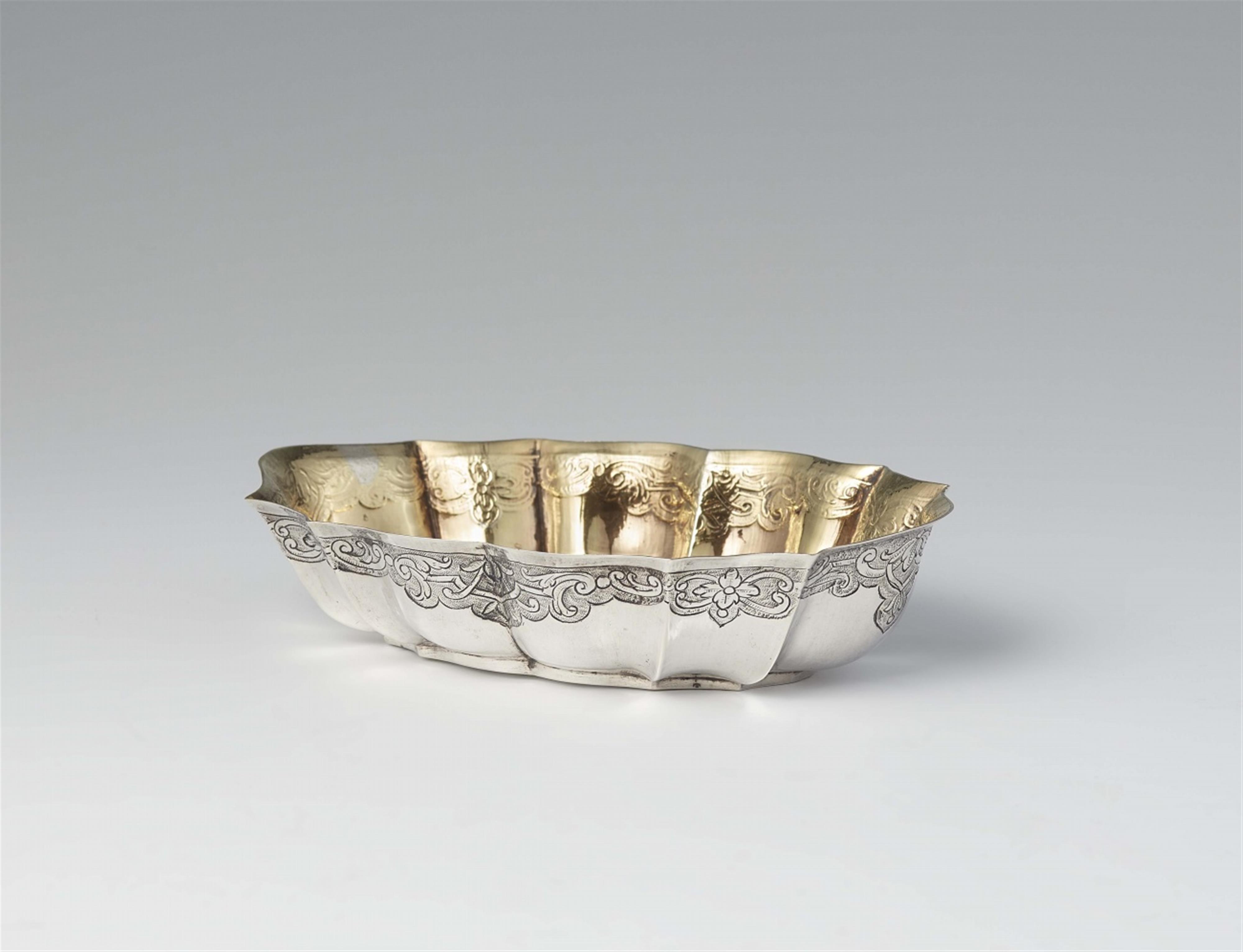 A small silver gilt drinking bowl with hunting decor - image-1