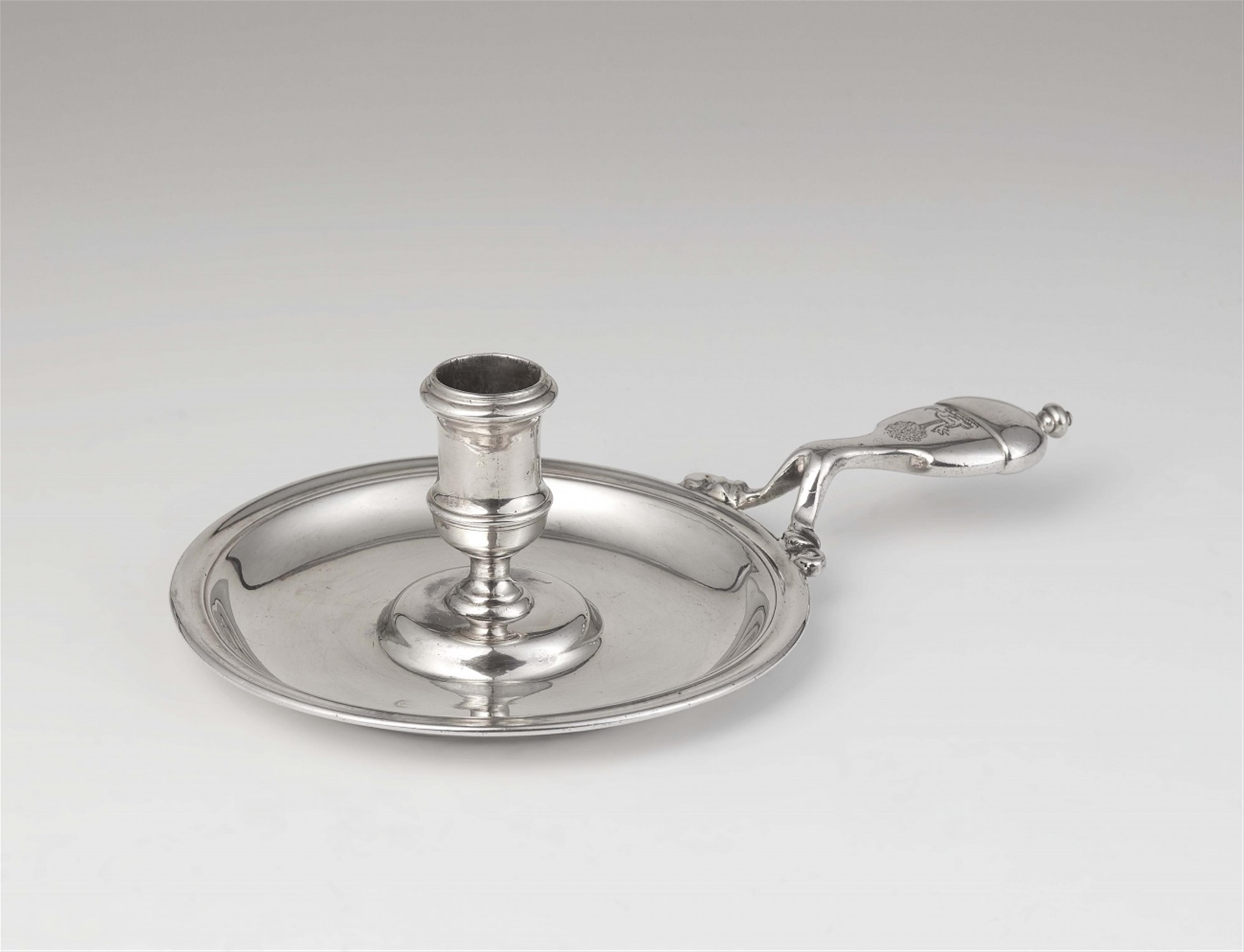 A George I silver chamberstick - image-1