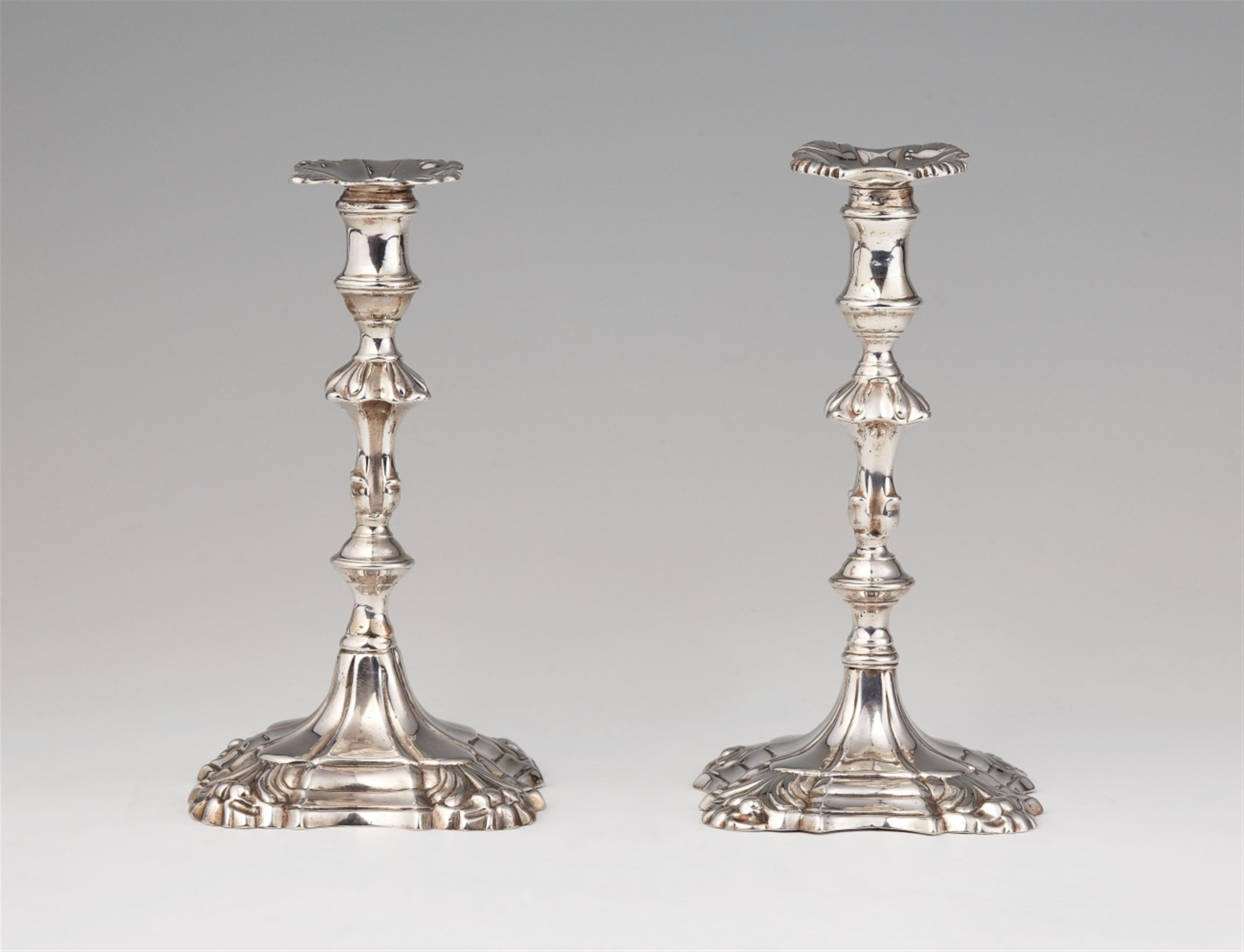 A pair of George II silver tapersticks - image-1