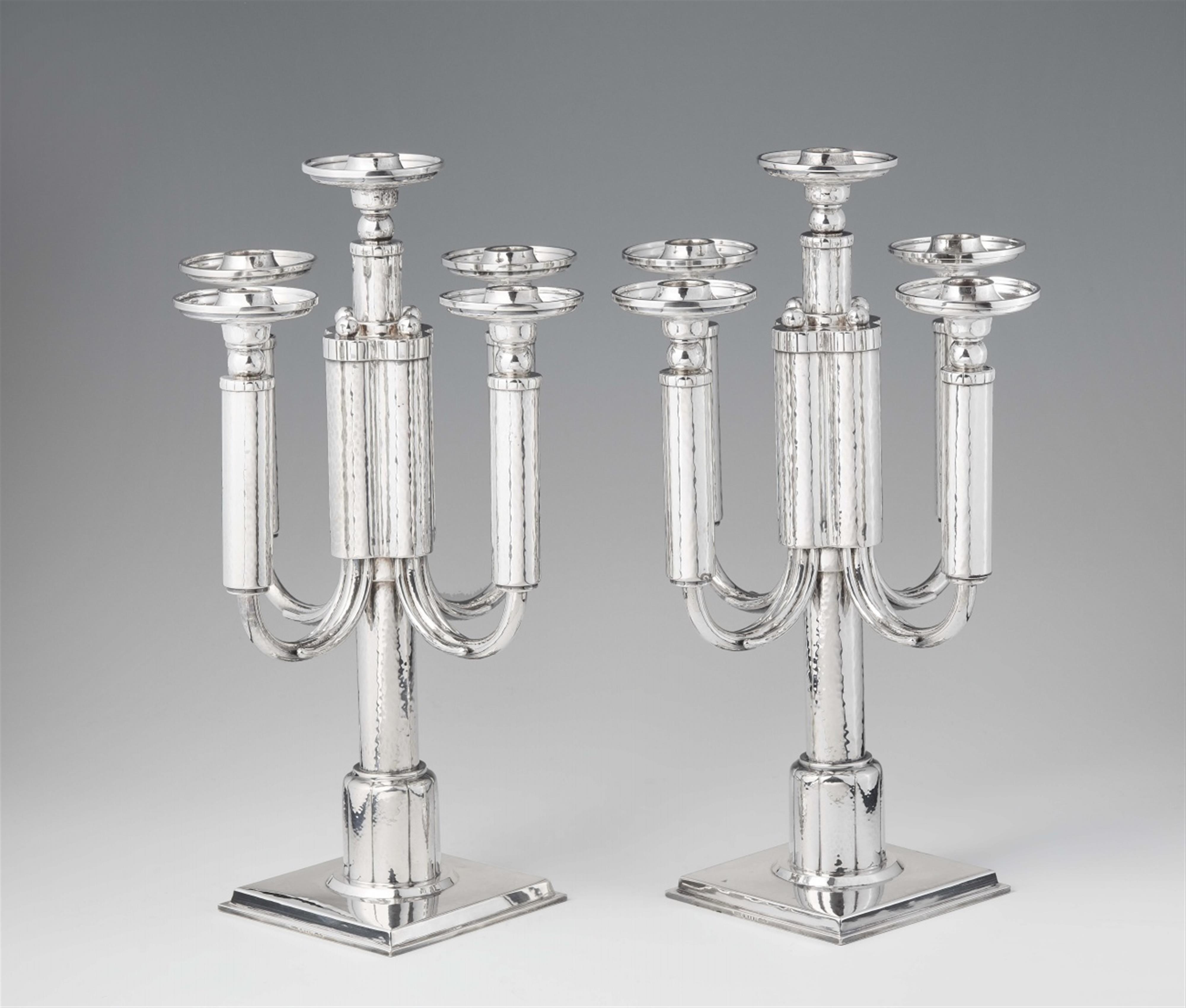 A pair of Art Deco silver candelabra - image-1