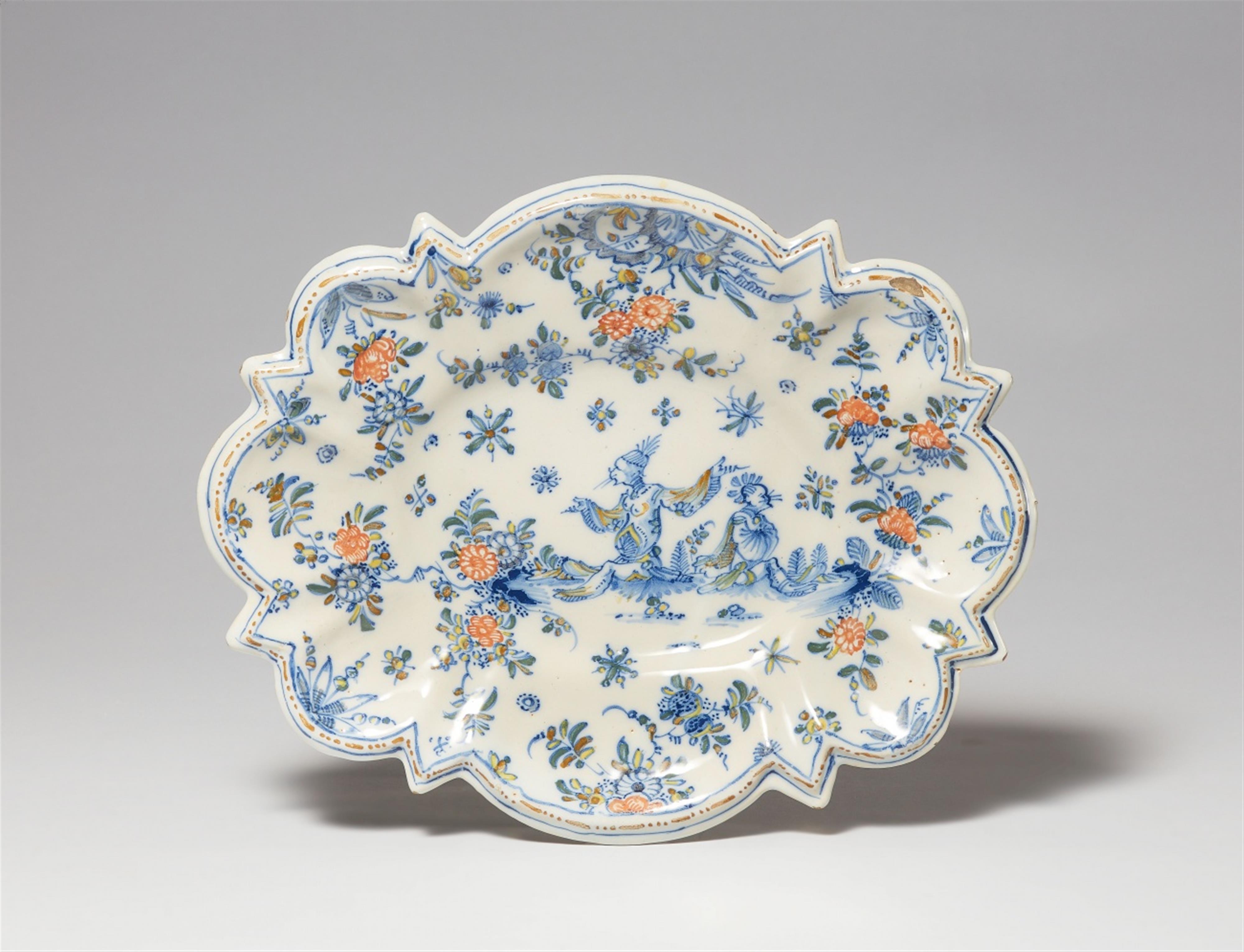 An oval Marseille faience platter with Chinoiserie decor - image-1