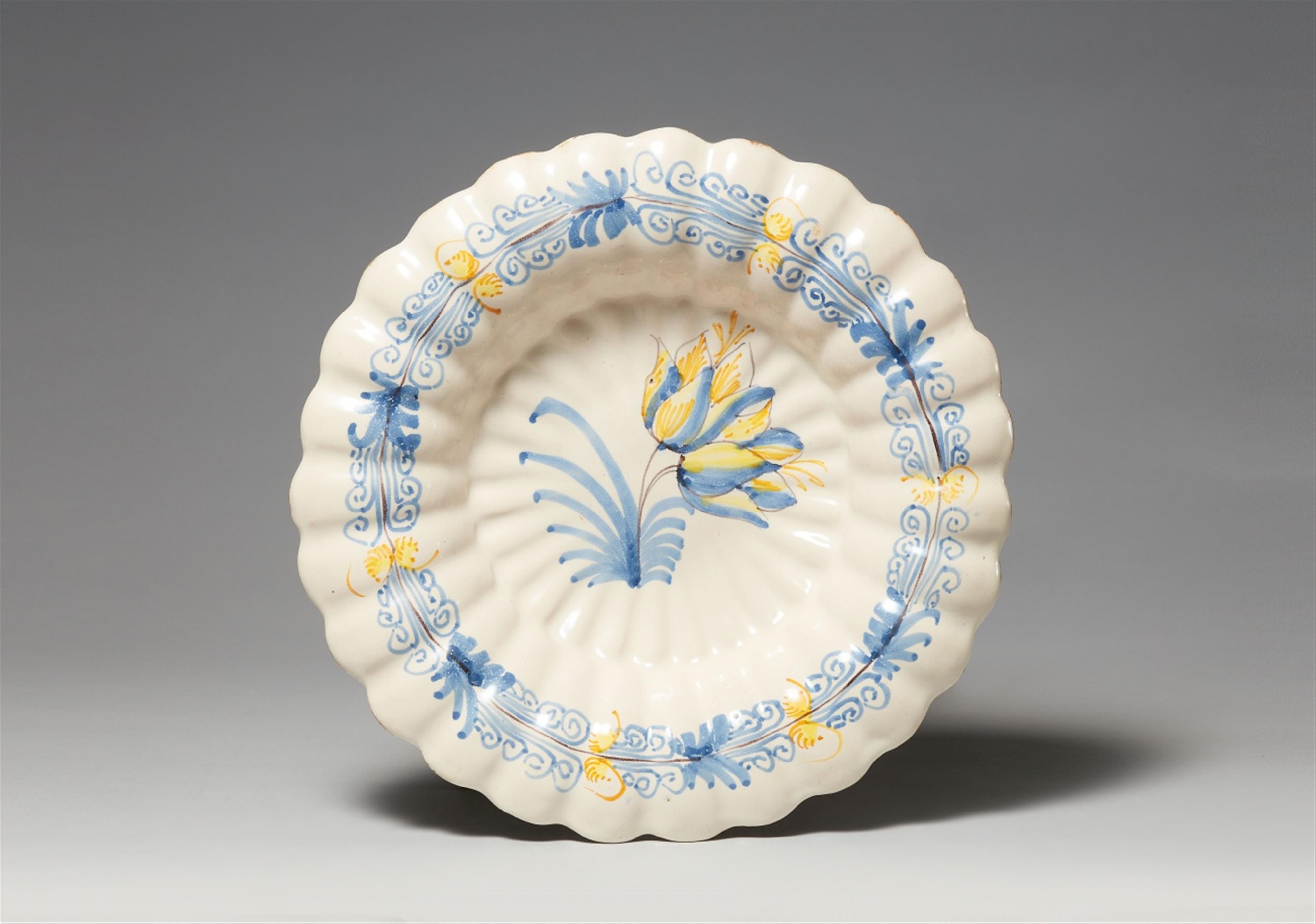 A scalloped Nevers faience dish - image-1