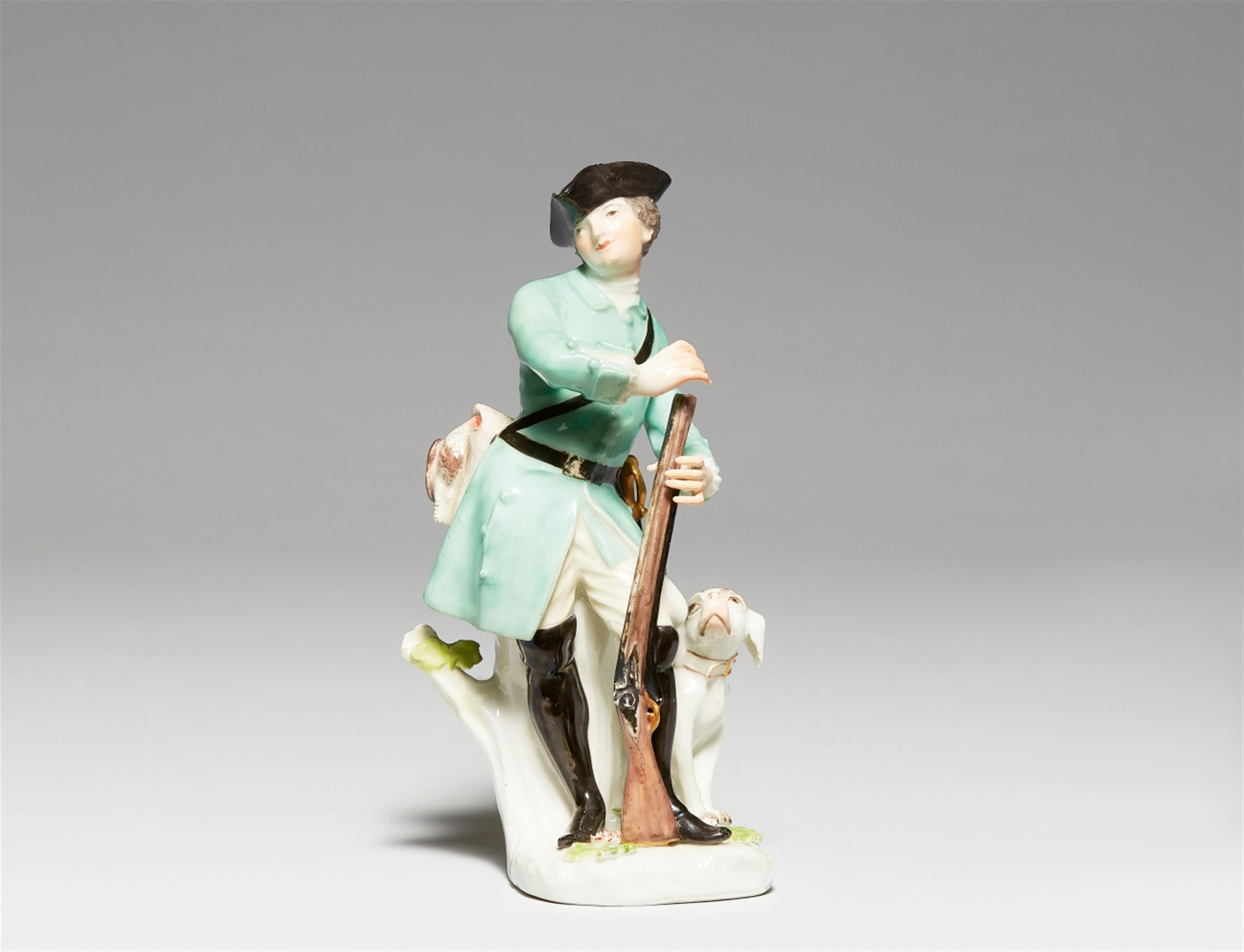 A Meissen porcelain figure of a hunter with a dog - image-1