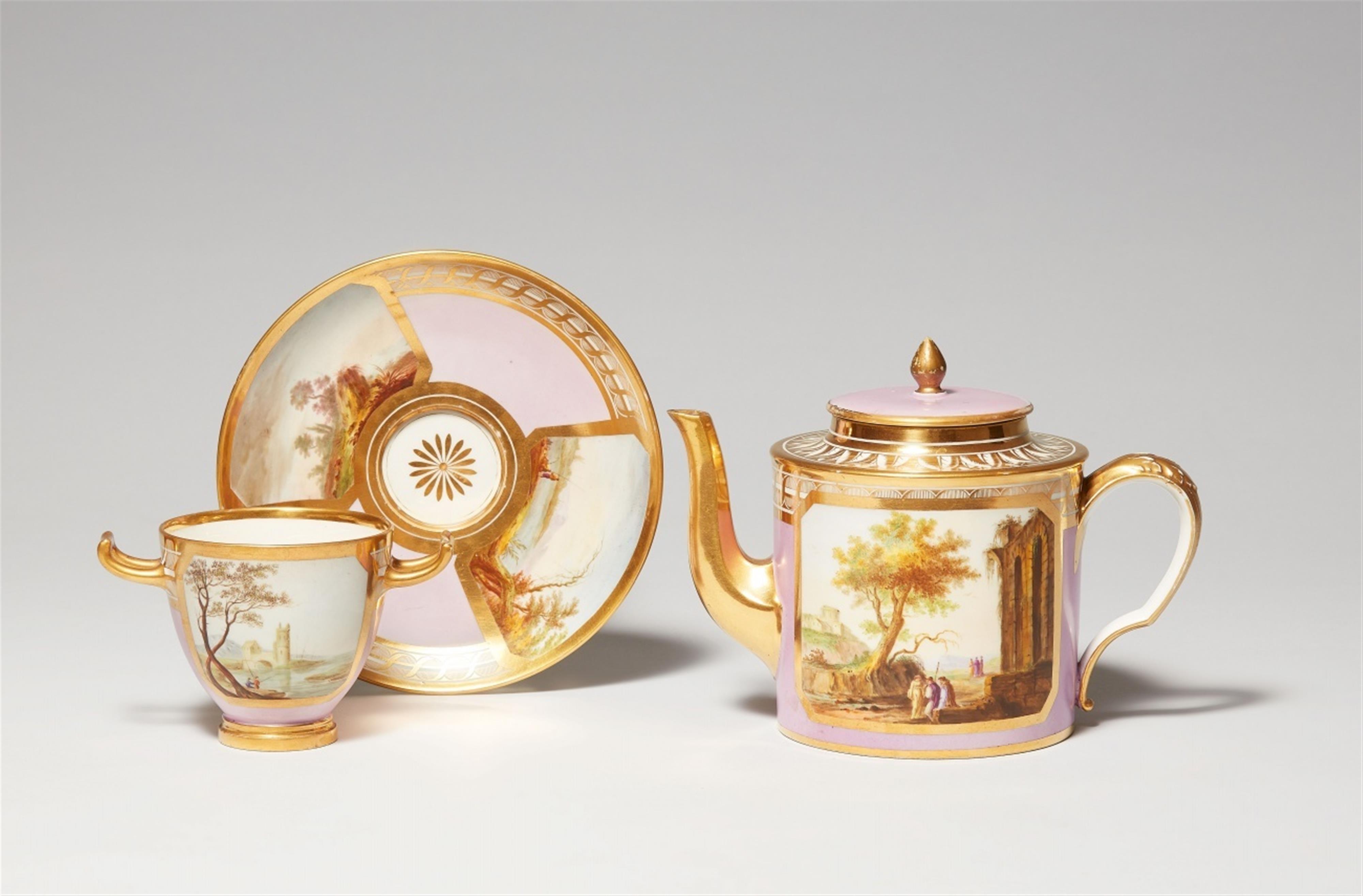 A Sèvres porcelain teapot and crater form dish with landscape decor - image-1
