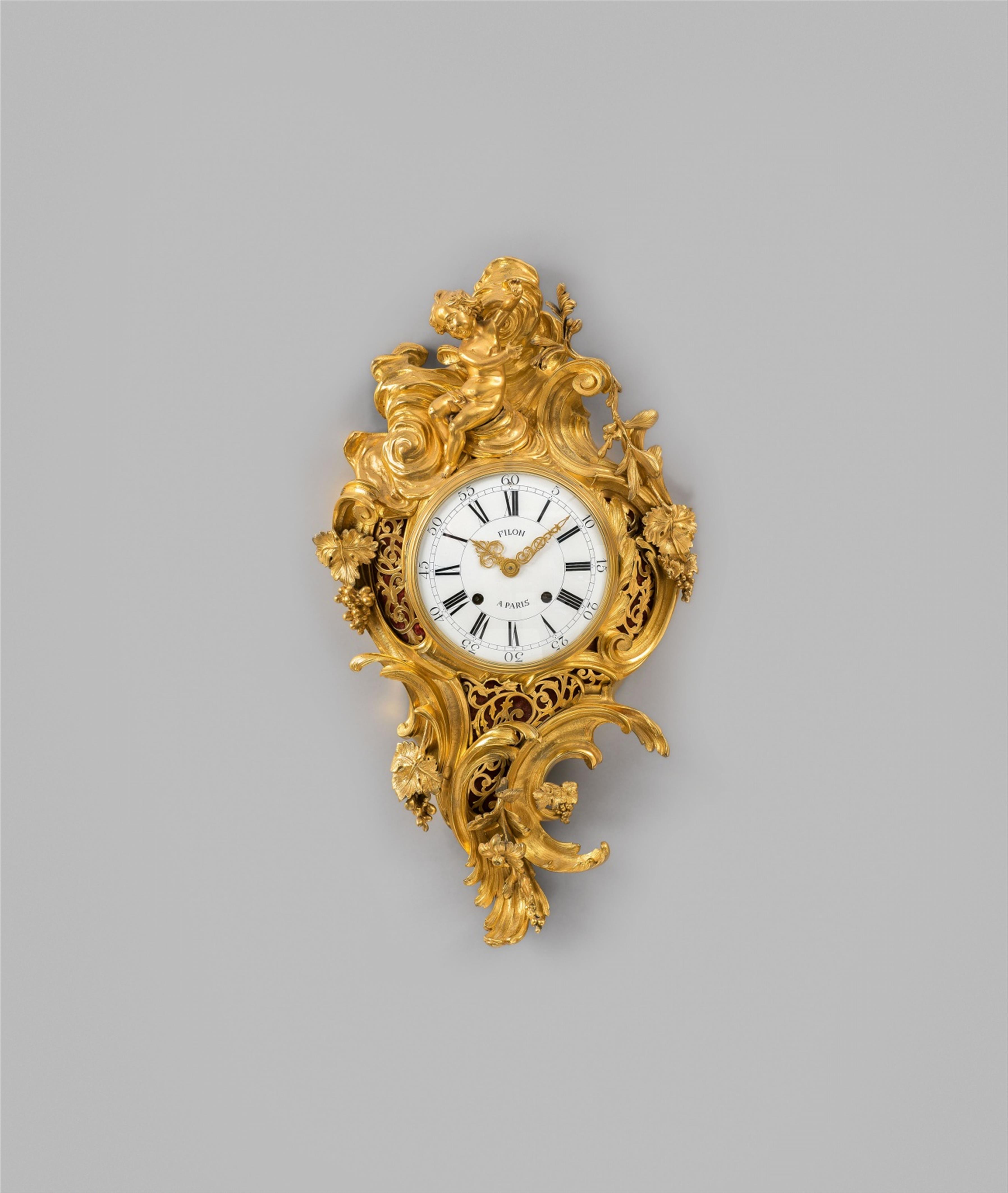 A large Louis XV ormolu cartel clock - image-1