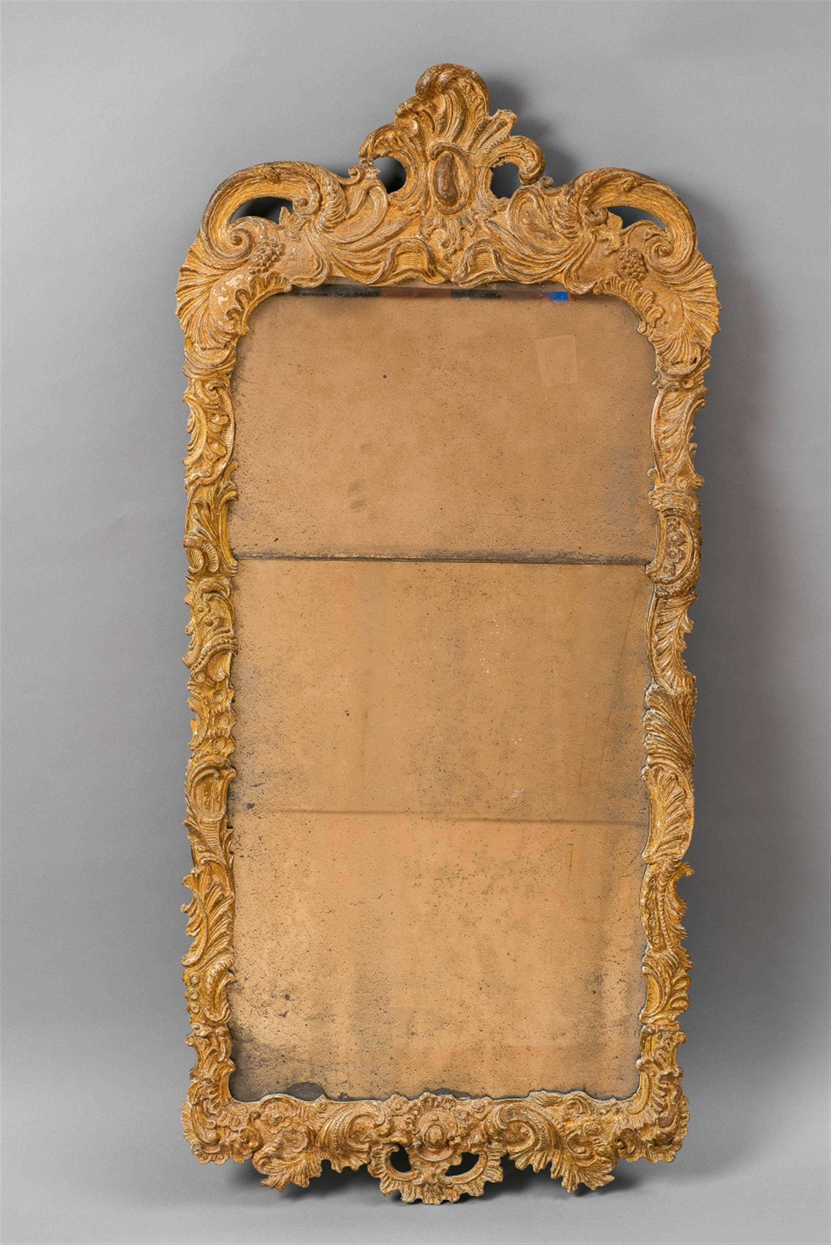 A Baroque giltwood mirror - image-1