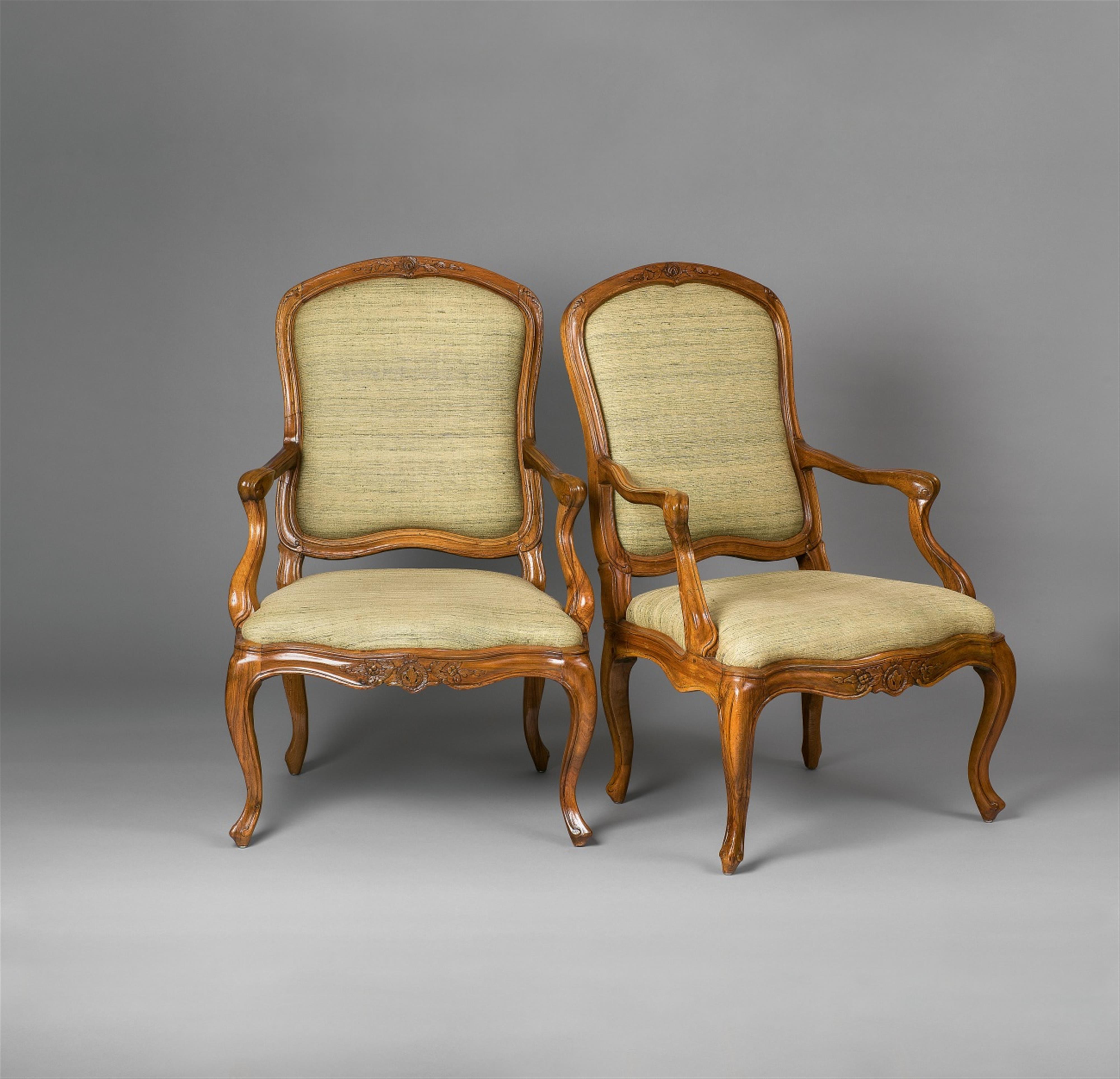 A pair of Genoan walnut armchairs - image-1