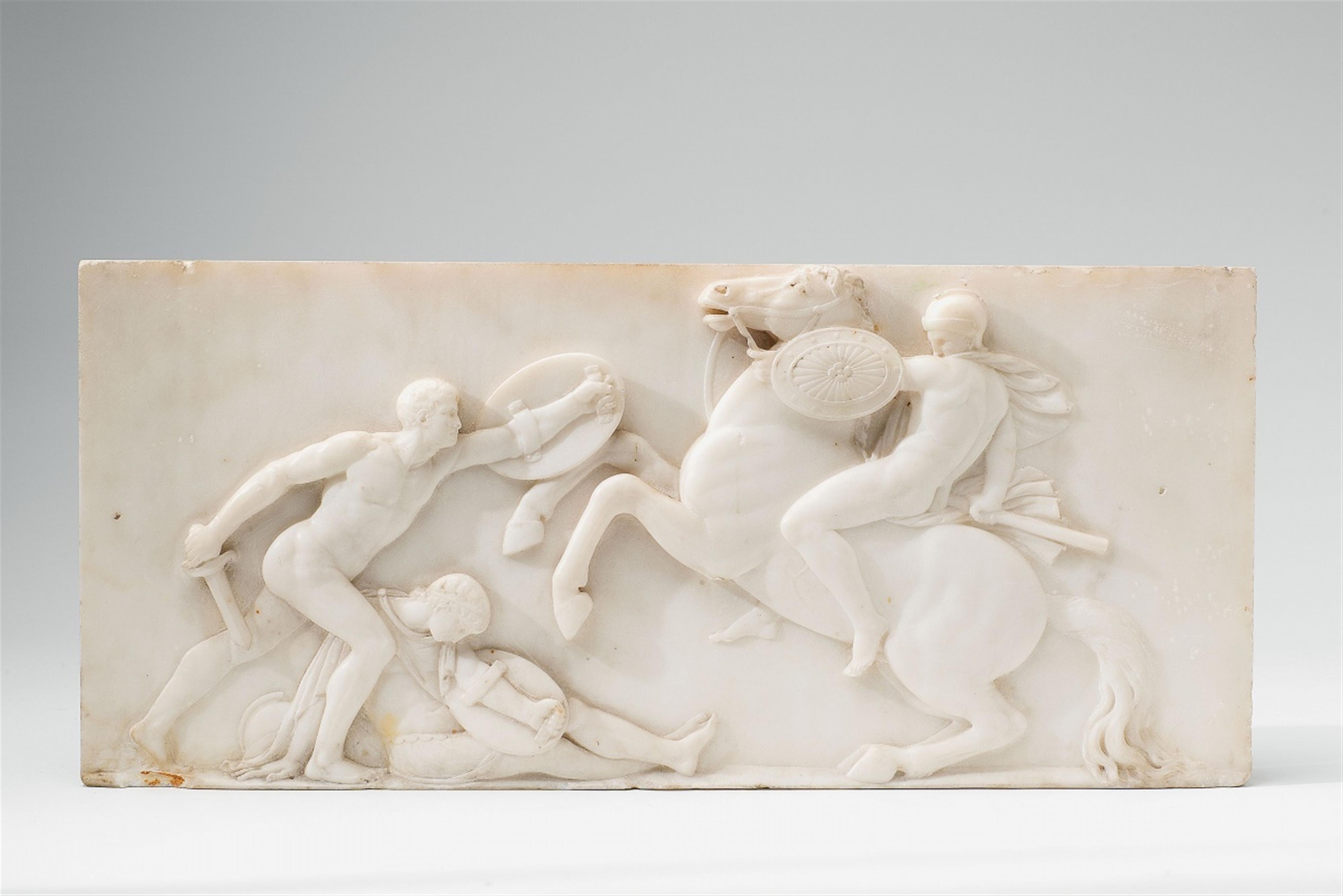 A white marble relief showing a battle scene - image-1
