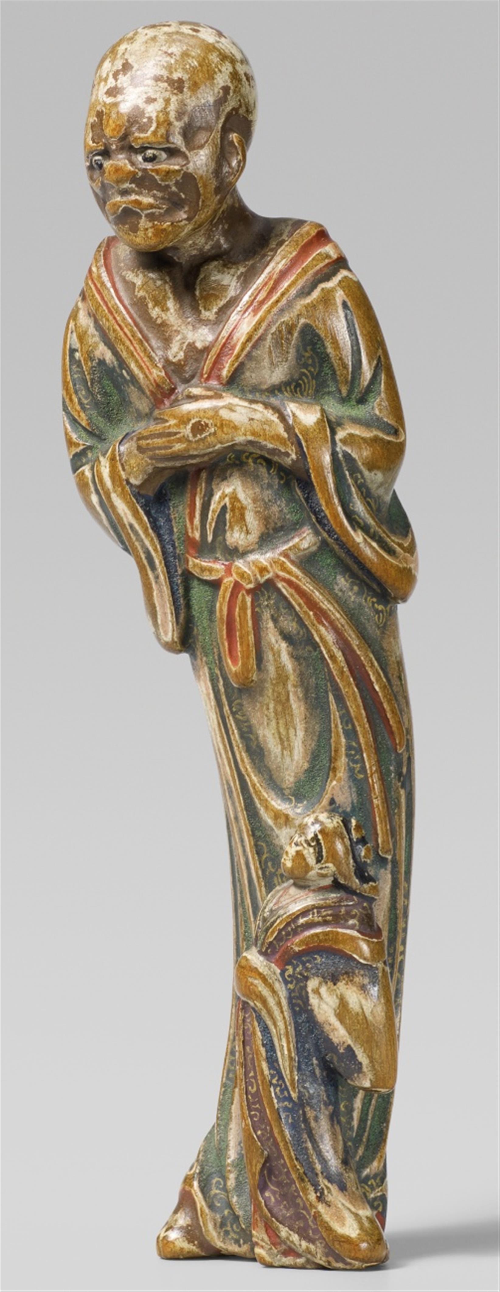 An interesting and rare polychromed cypress wood netsuke of figure group. 18th century - image-1