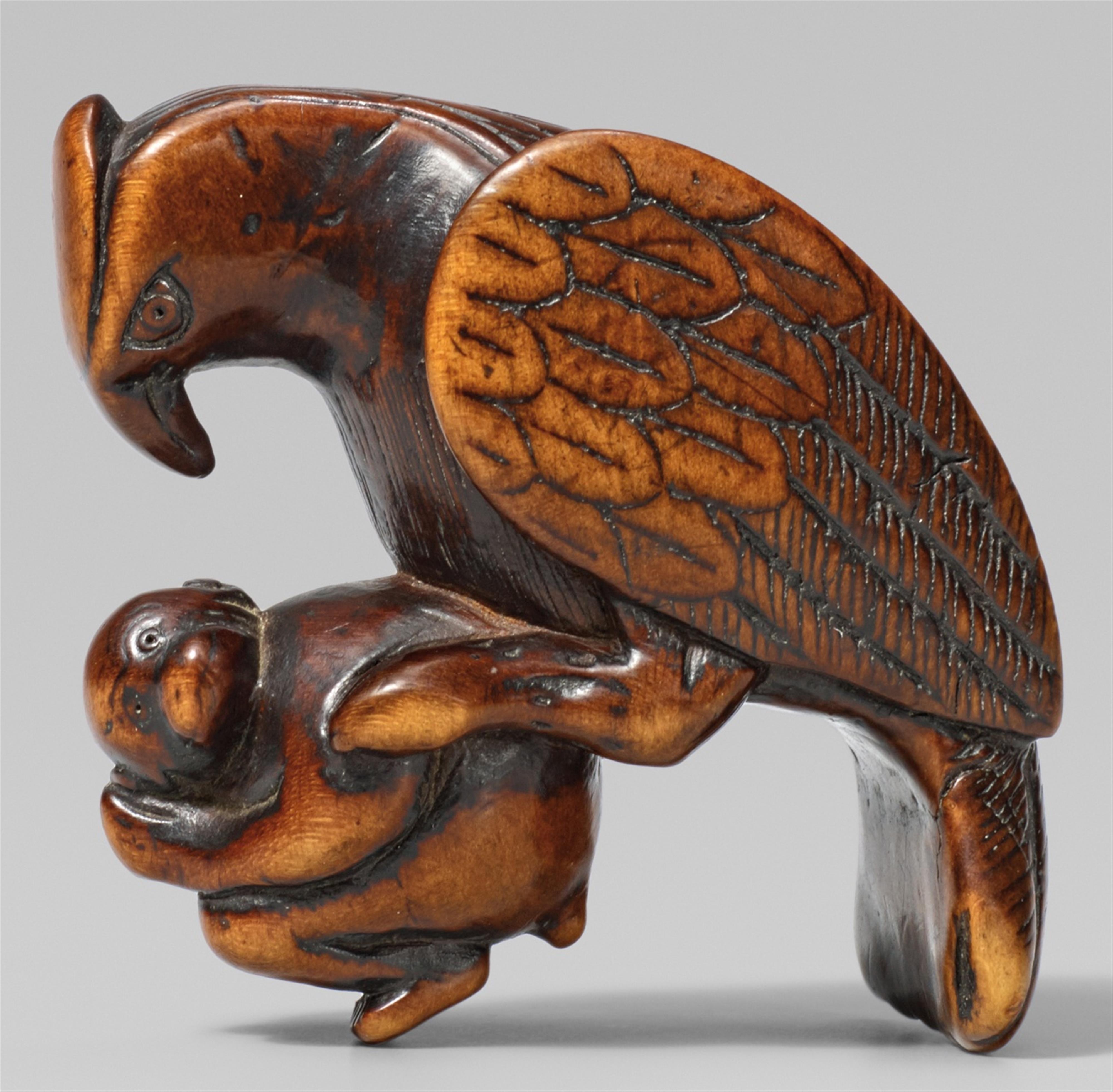A large boxwood netsuke of an eagle and monkey. 18th/early 19th century - image-1
