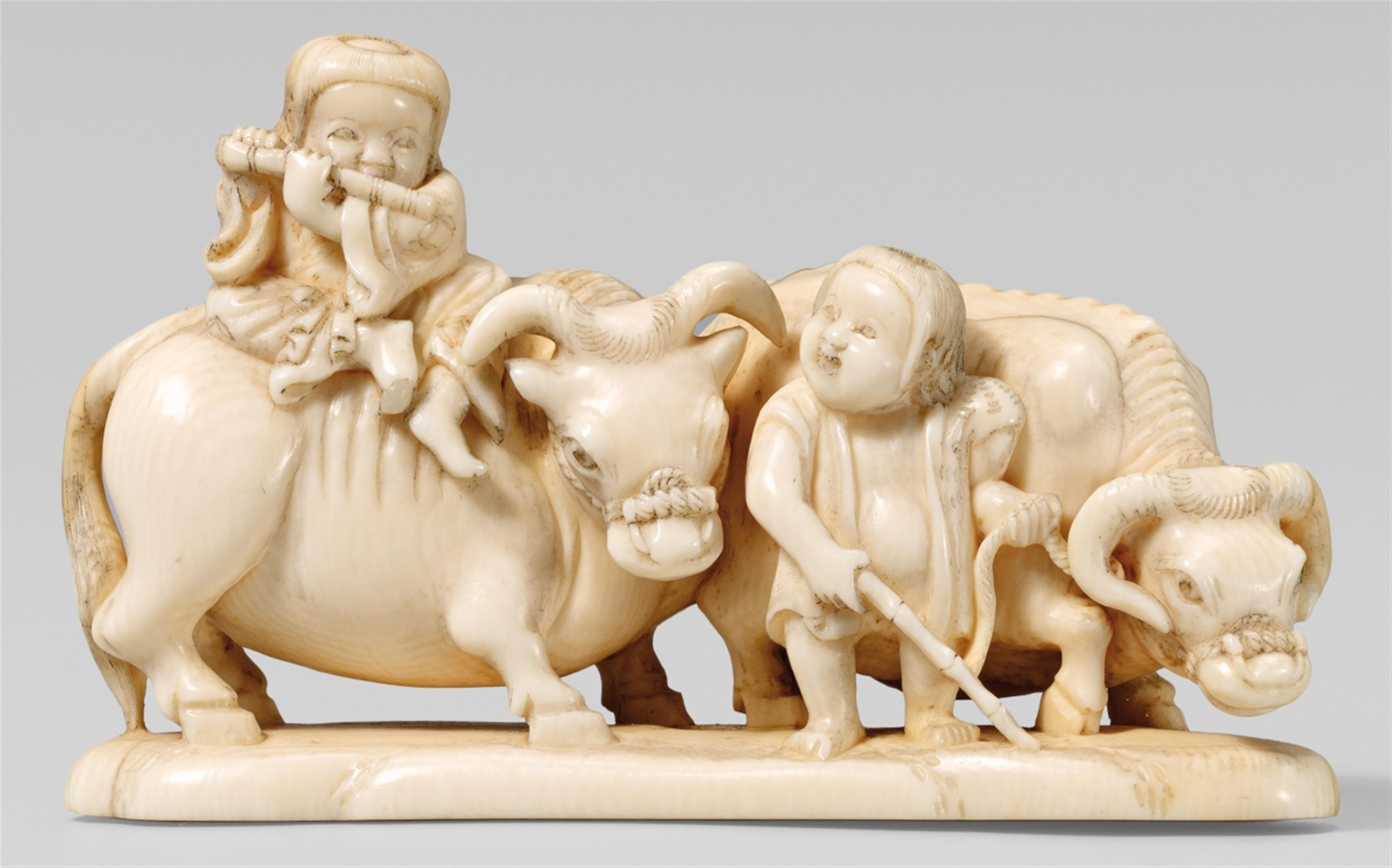 An okimono-type ivory netsuke of two herdboys with oxen, by Hôshinsai. Second half 19th century - image-1