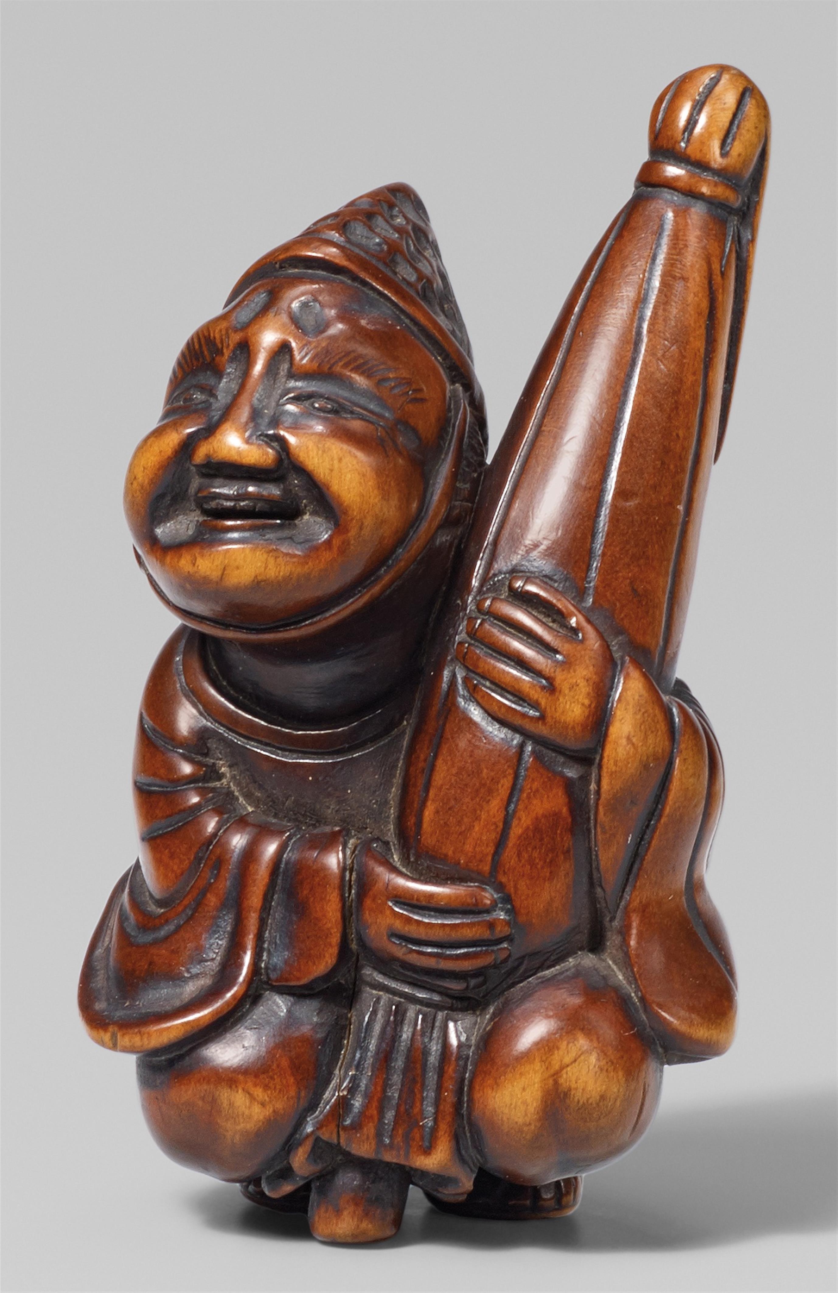 A boxwood netsuke of a court servant (eji). First half 19th century - image-1