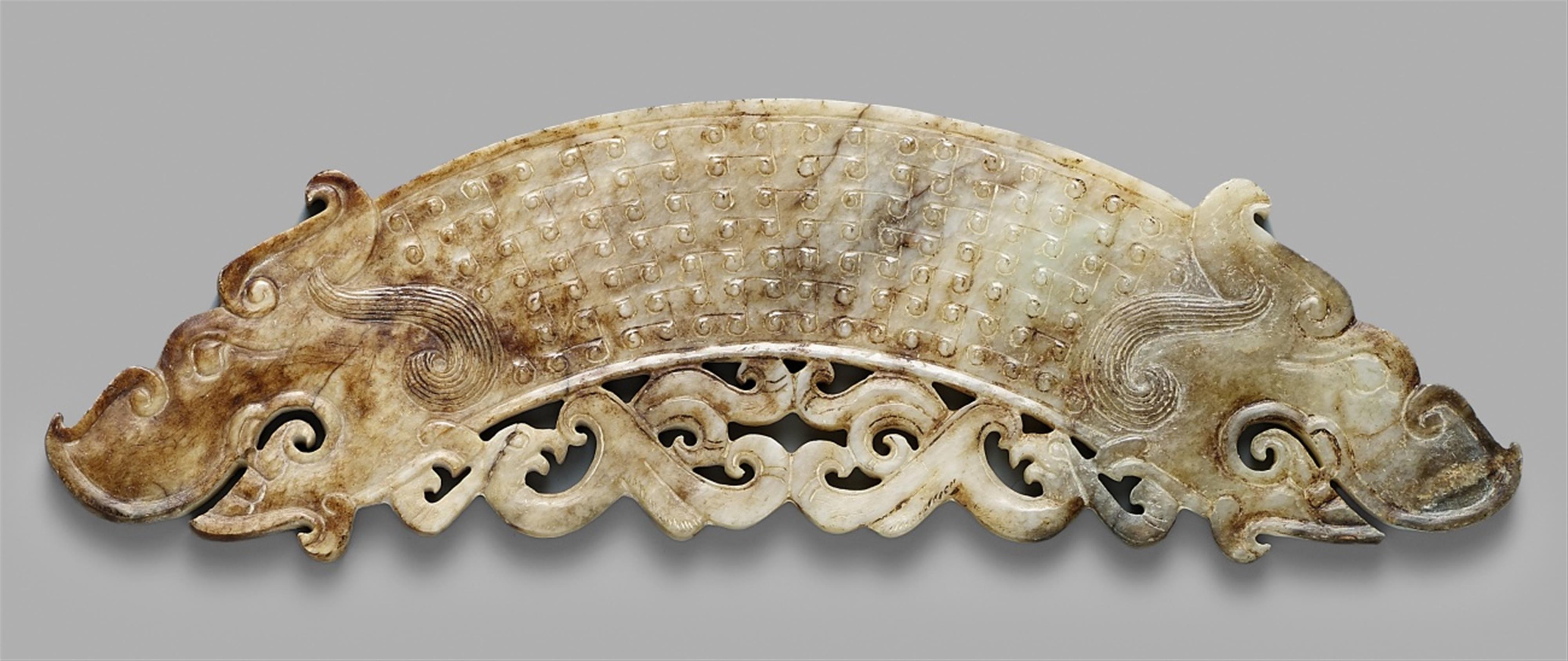 A jade ornament (huang). Zhou dynasty style - image-1