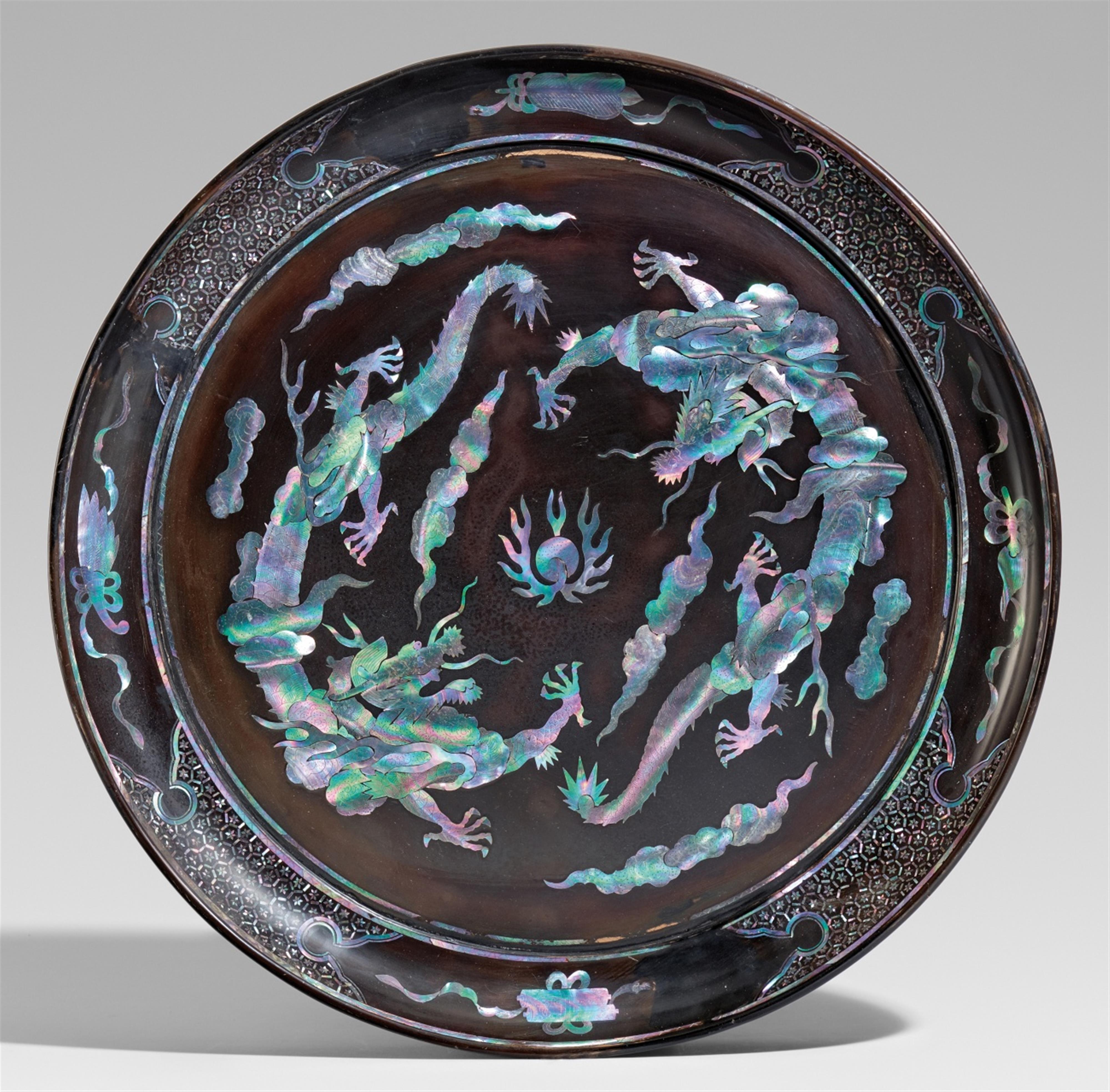 A large black lacquer and mother-of-pearl charger. Ryûkyû. 18th century - image-1