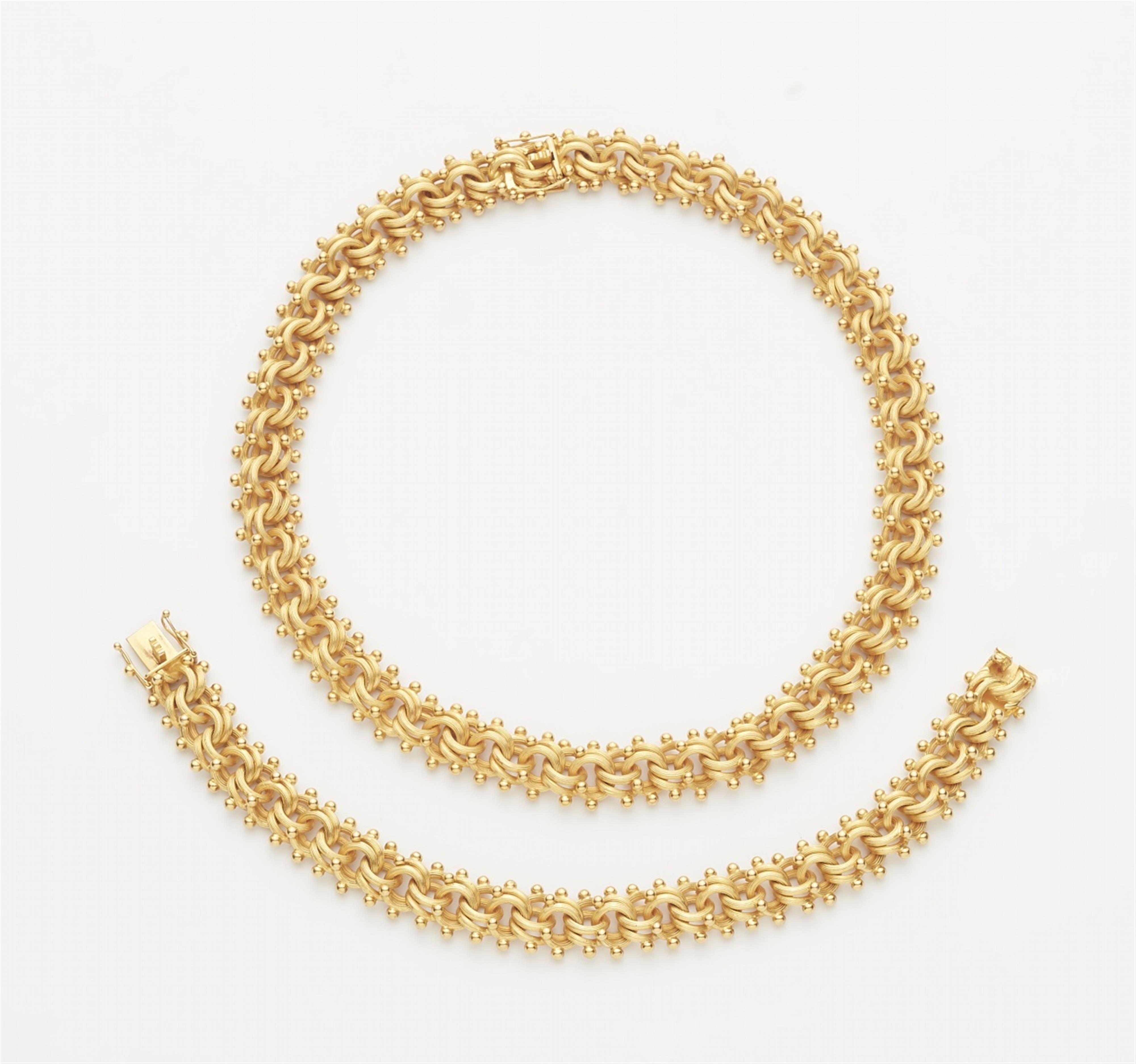 A 14k gold chain necklace and bracelet - image-1