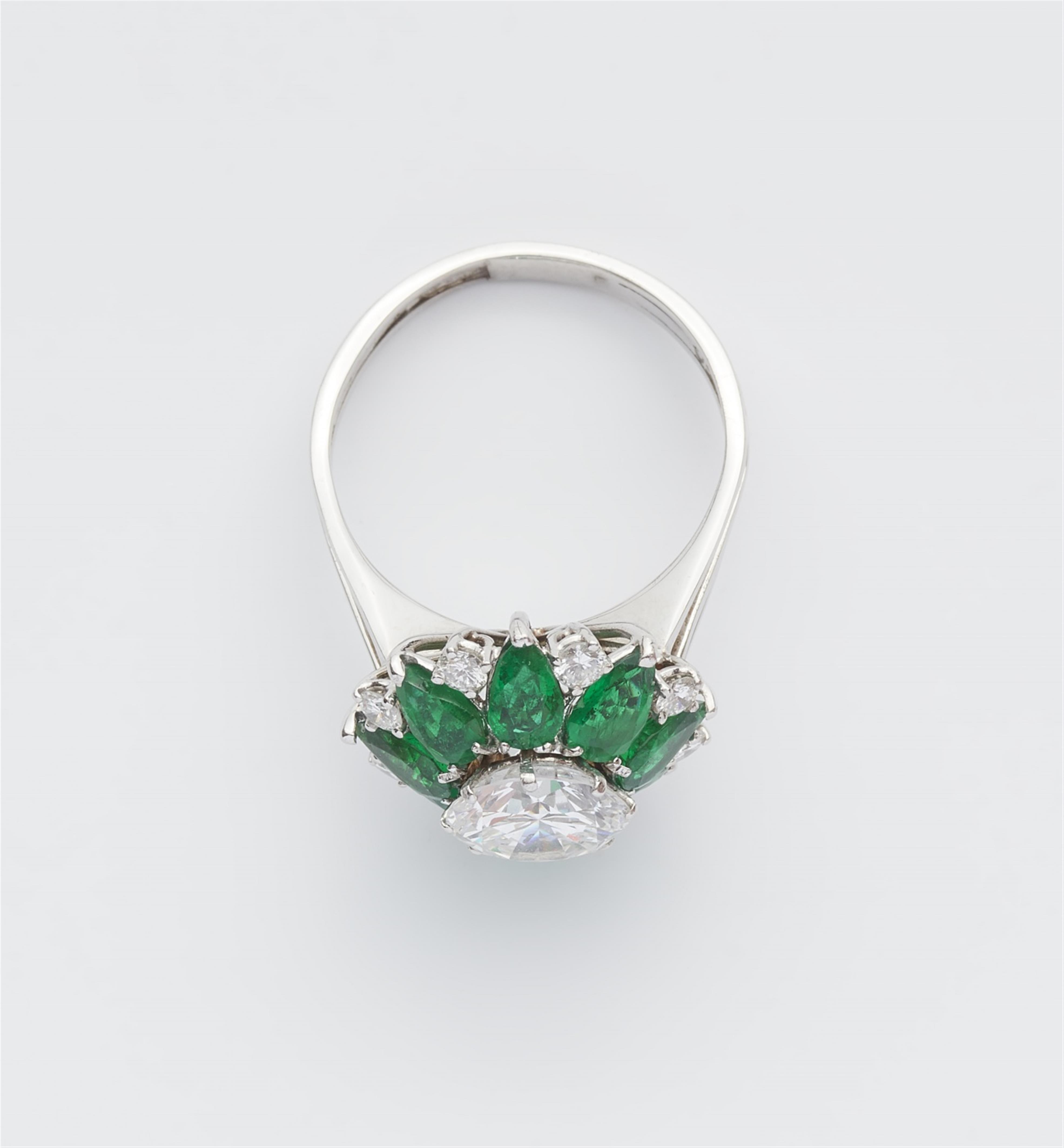 An emerald and diamond ring - image-3