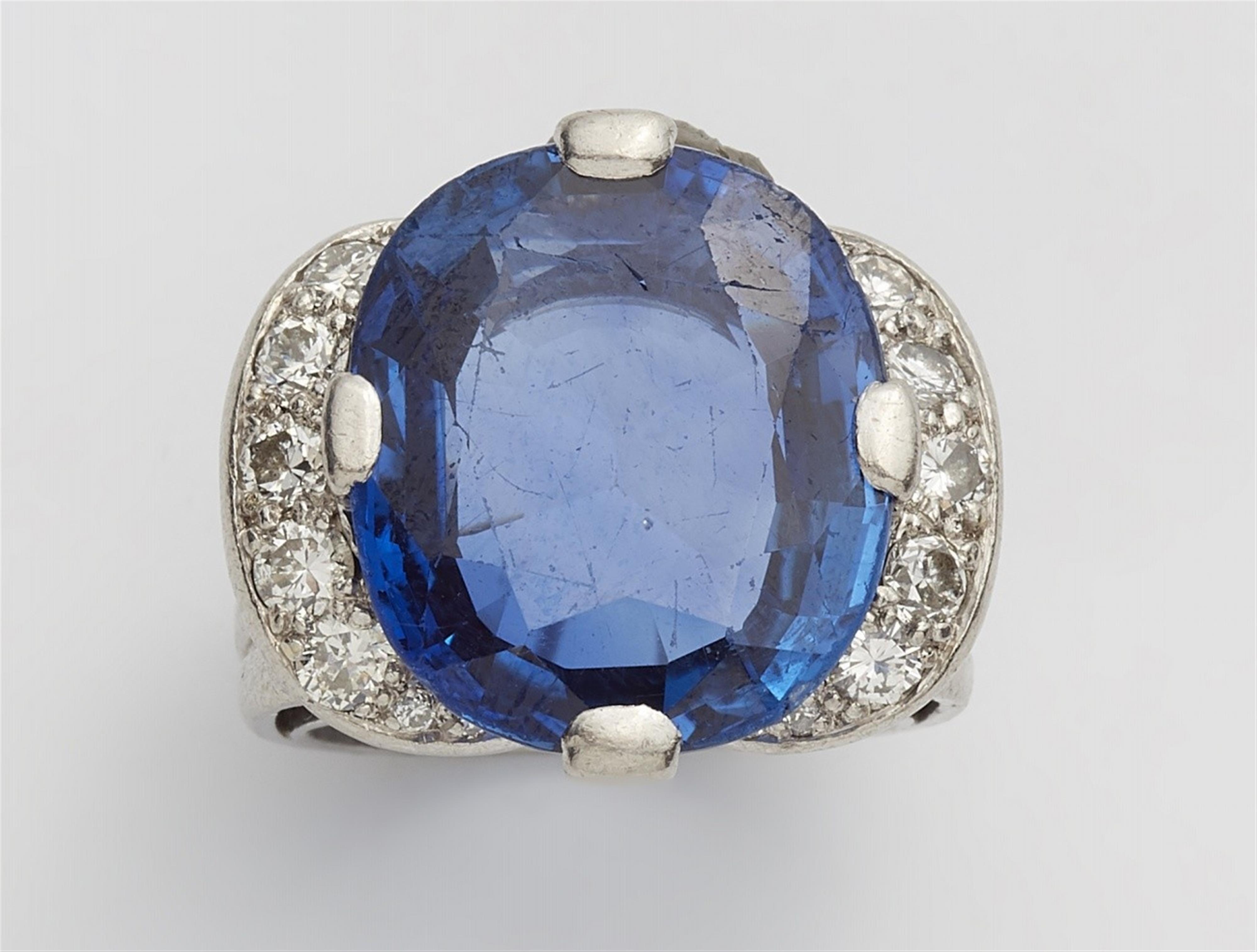 A platinum, sapphire, and diamond retro style ring - image-1