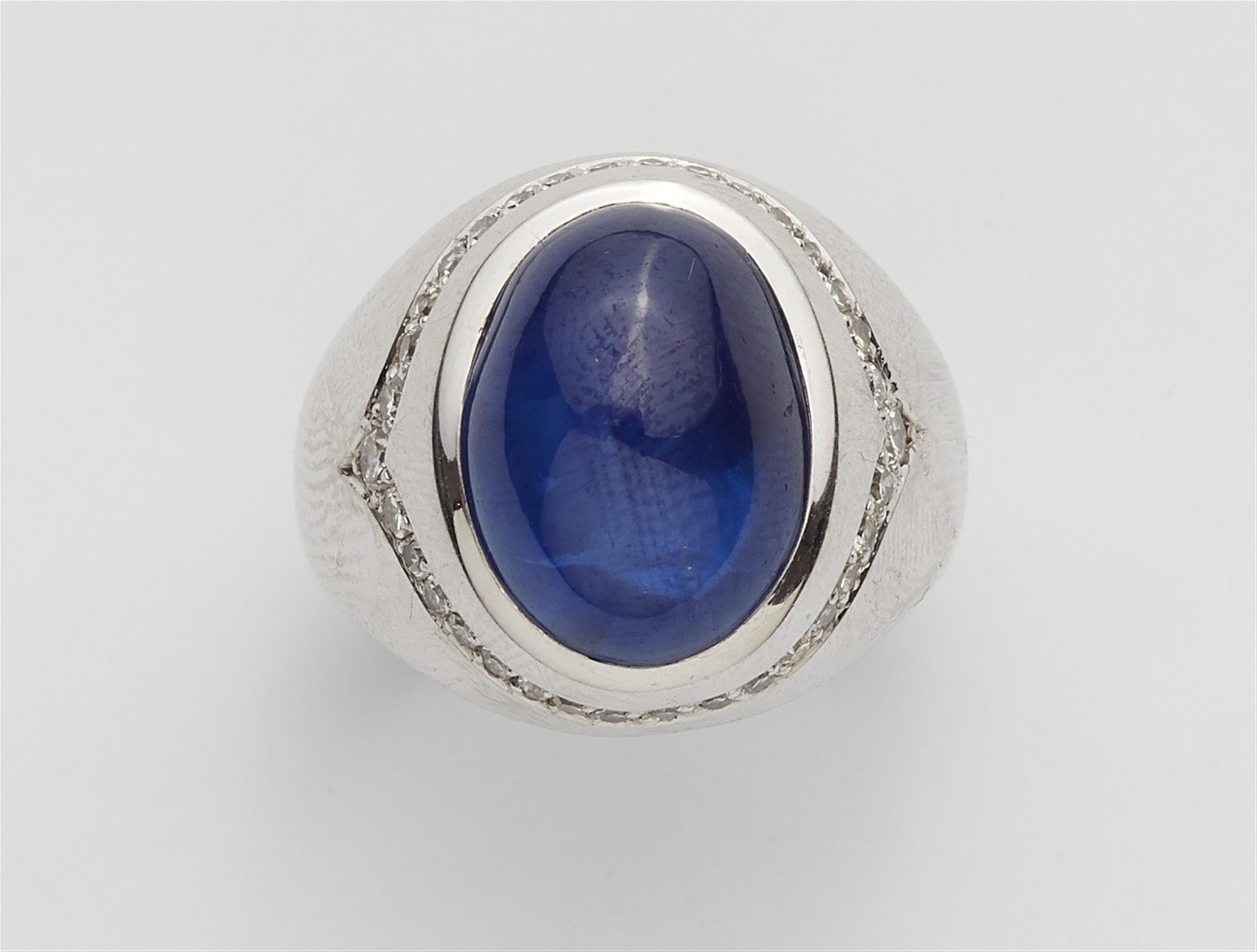 An 18k white gold and sapphire ring - image-1