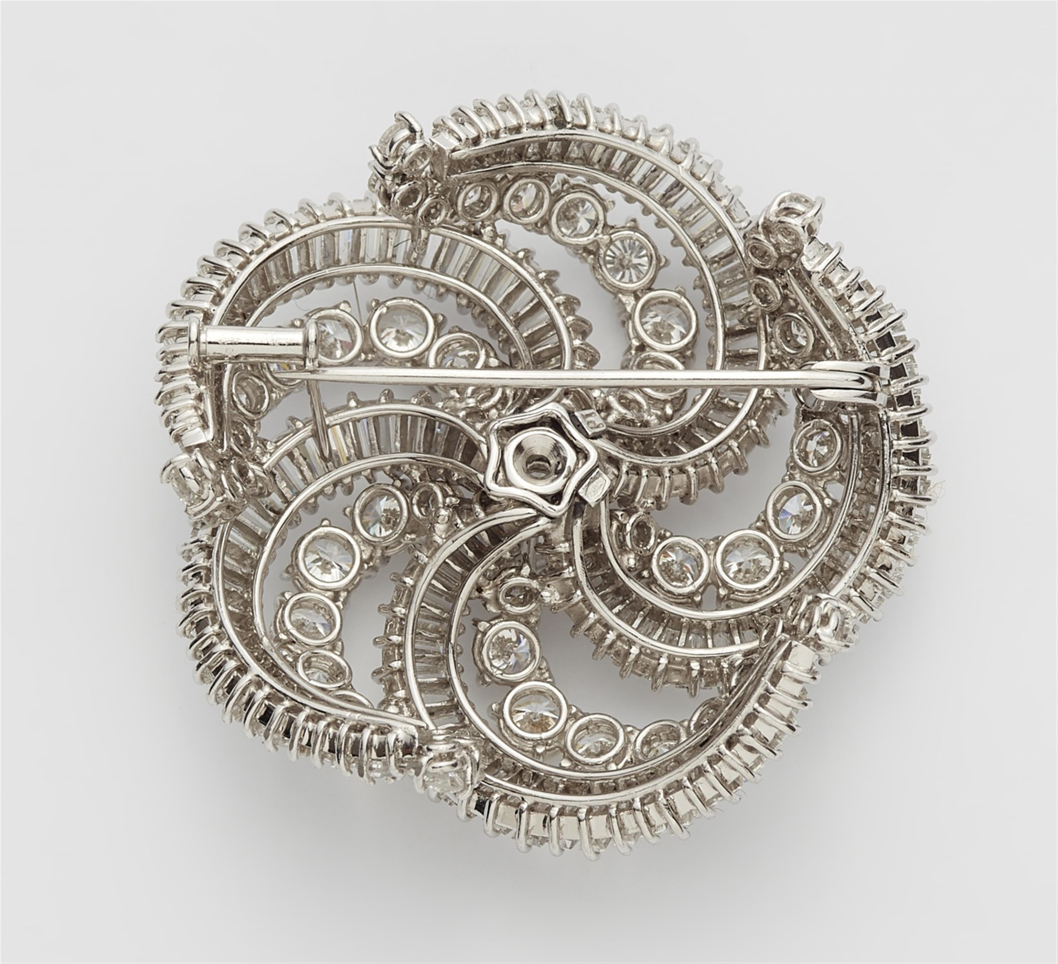An 18k white gold, platinum, and diamond cocktail brooch - image-2