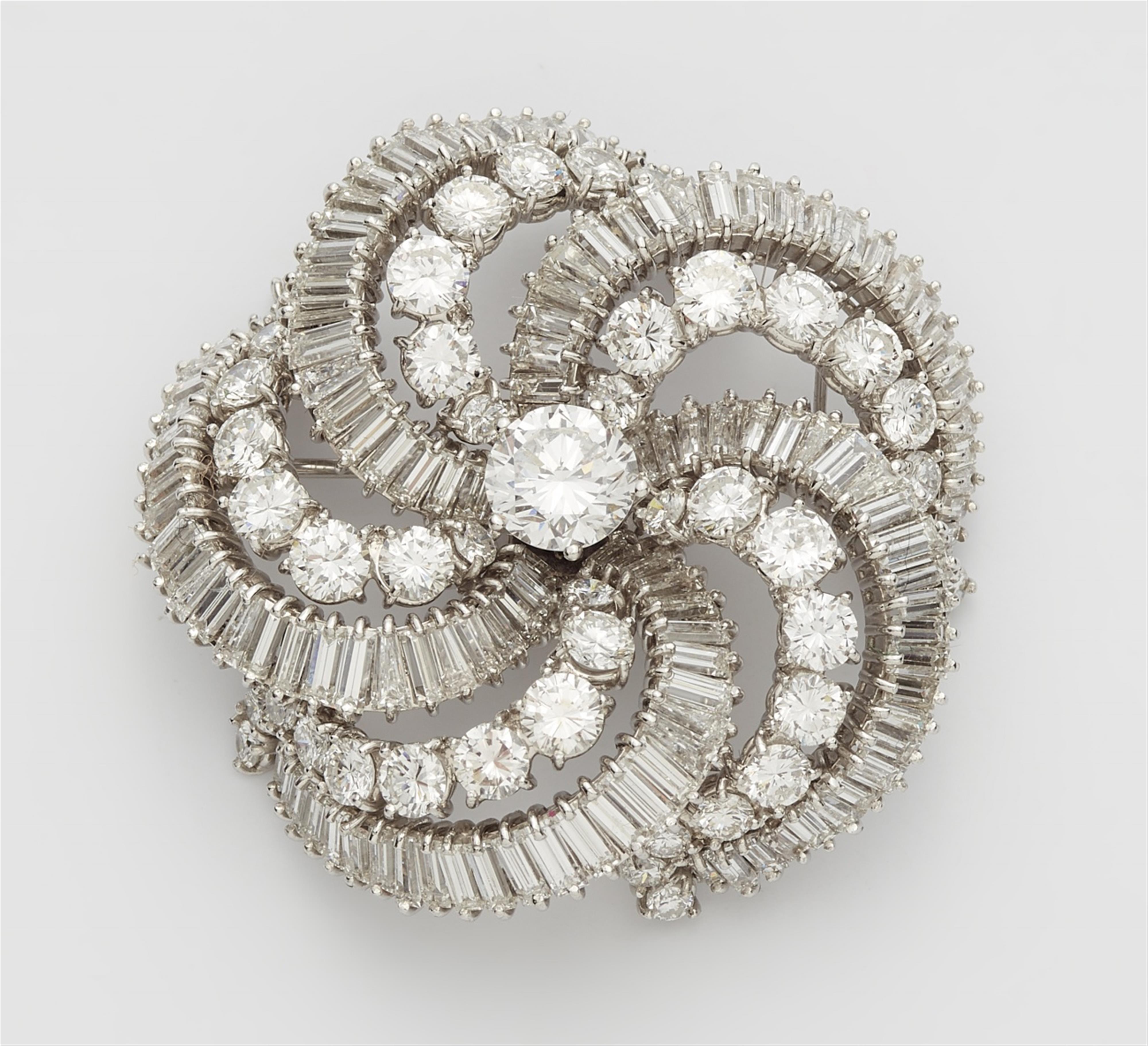 An 18k white gold, platinum, and diamond cocktail brooch - image-1