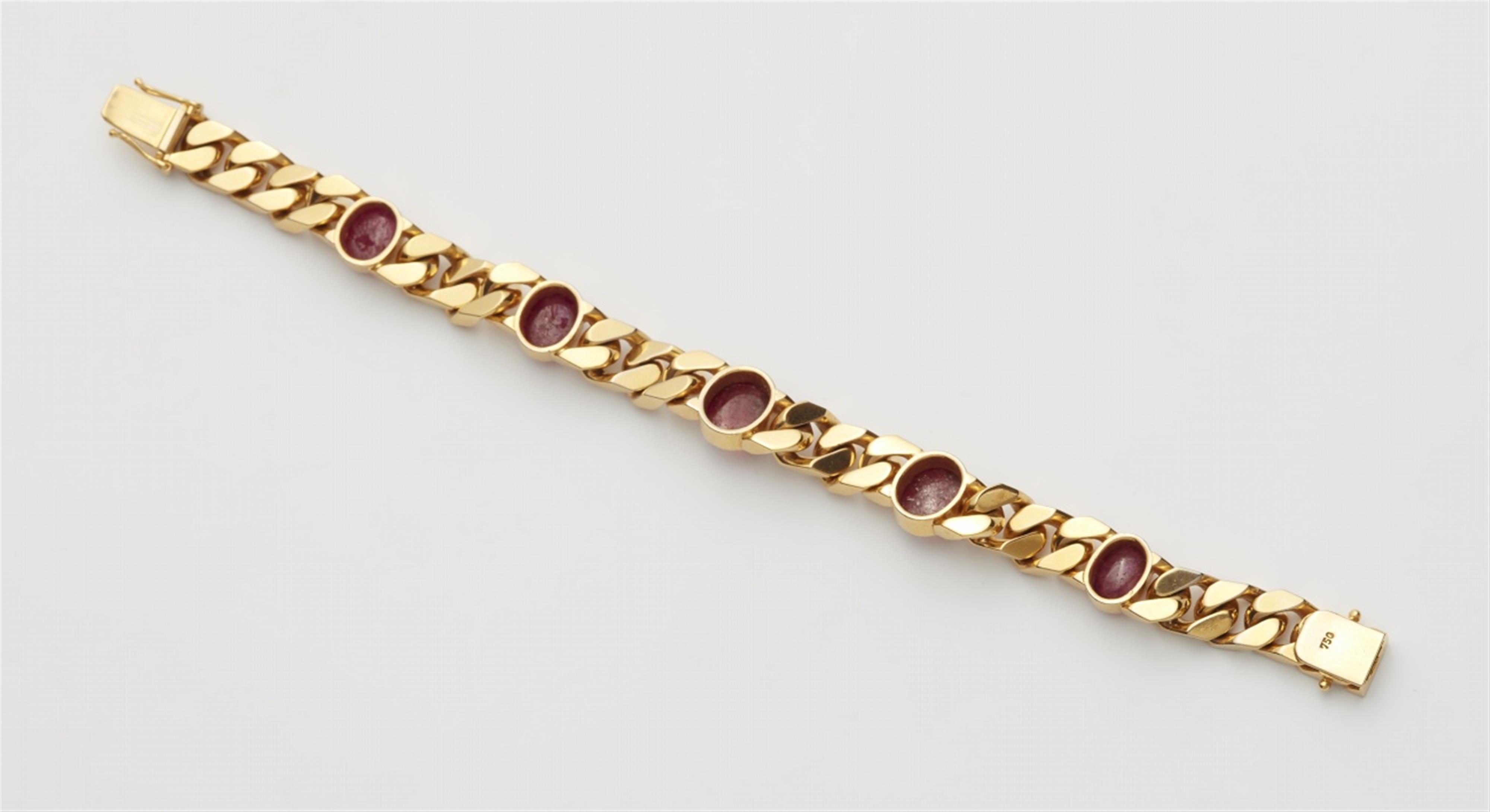 An 18k gold and ruby chain bracelet - image-2