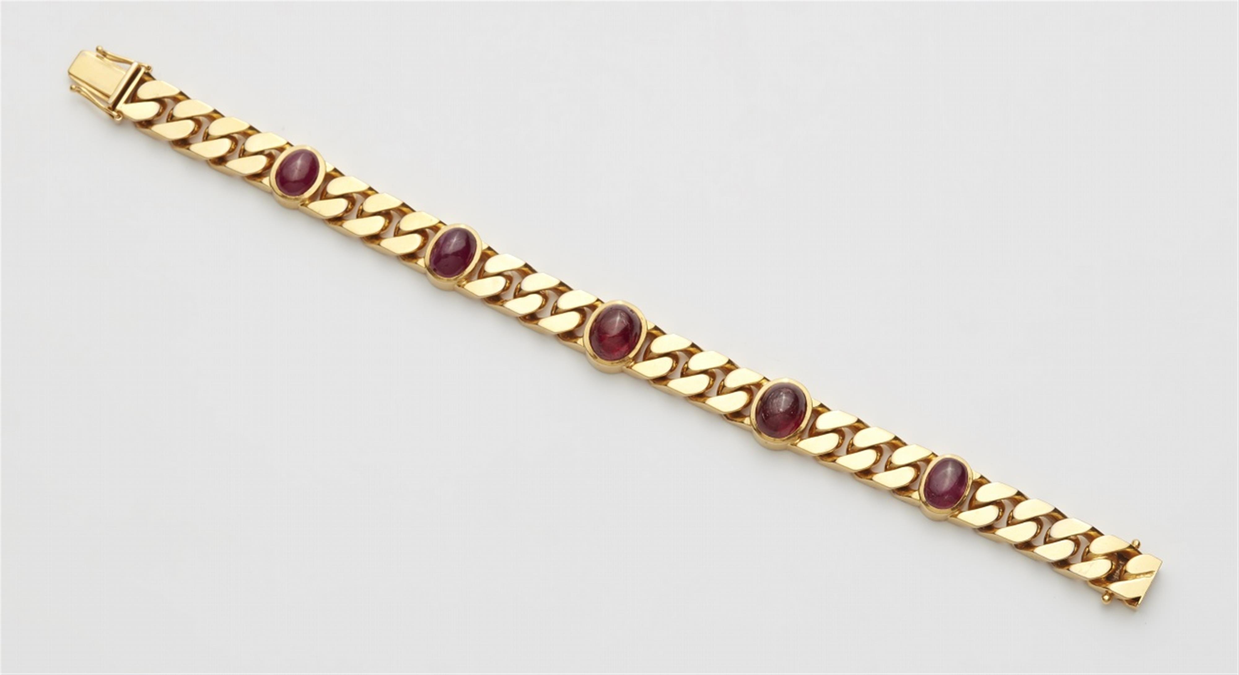 An 18k gold and ruby chain bracelet - image-1