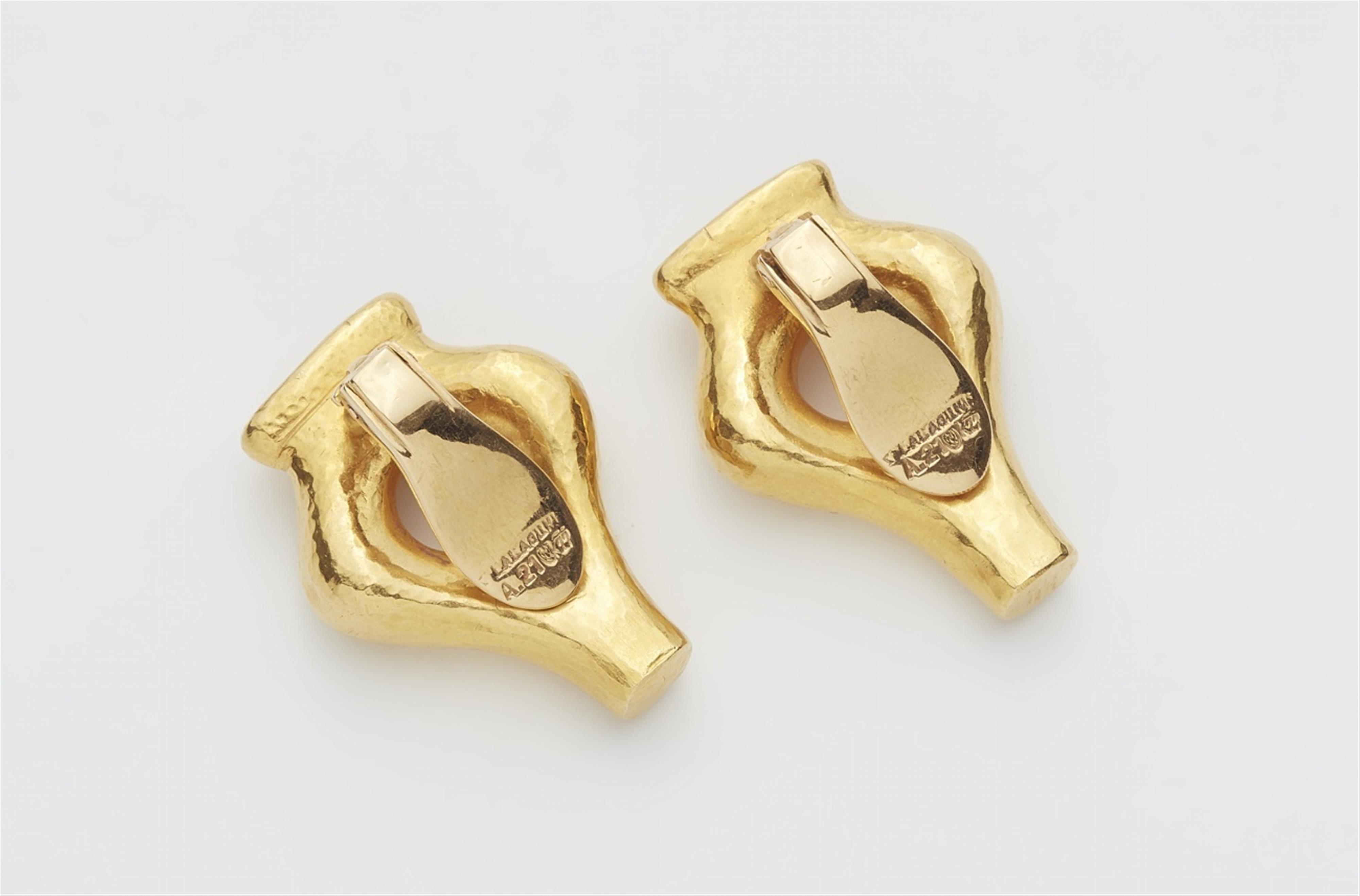 A pair of 21k gold clip earrings - image-2