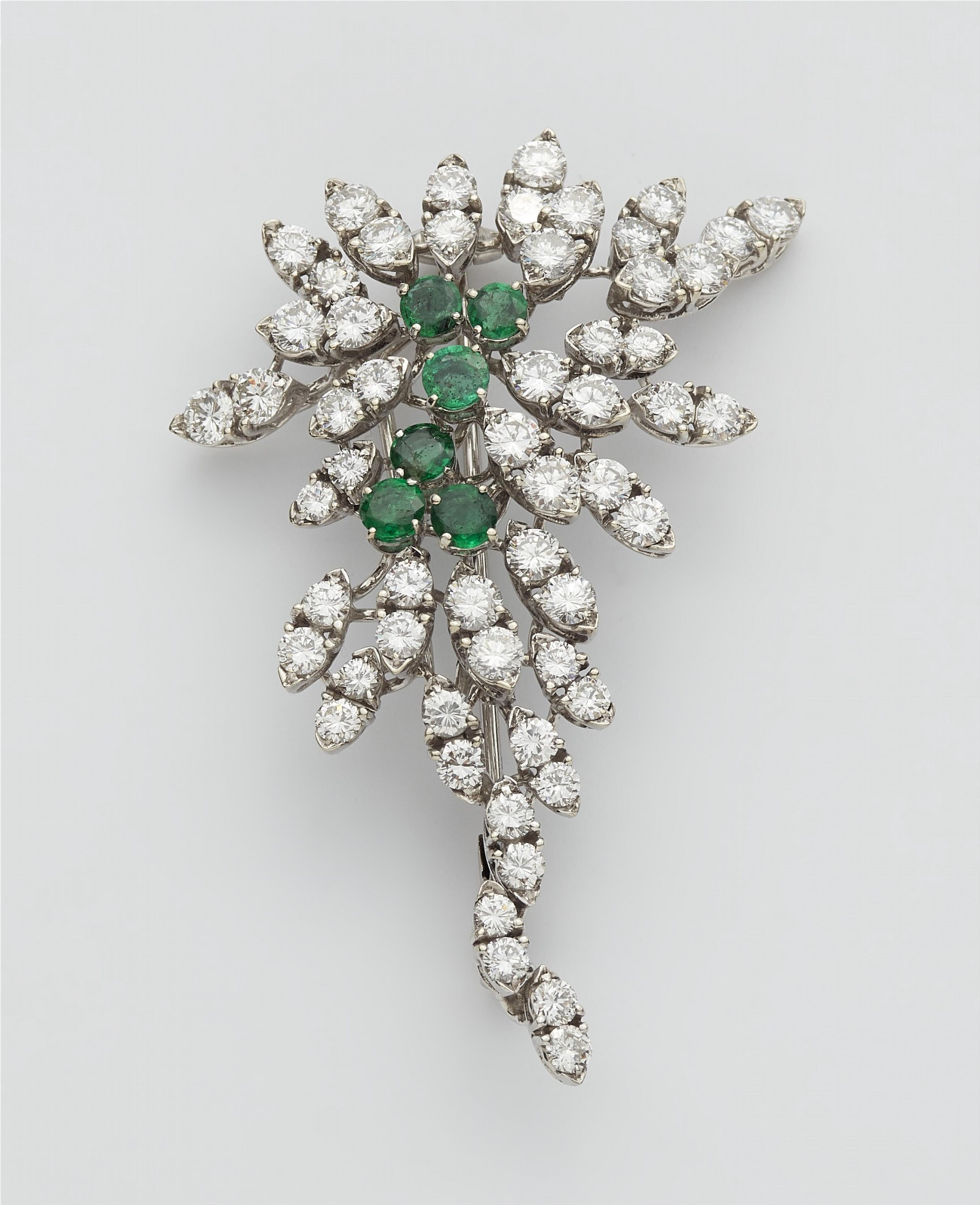 An 18k white gold, diamond, and emerald brooch - image-1