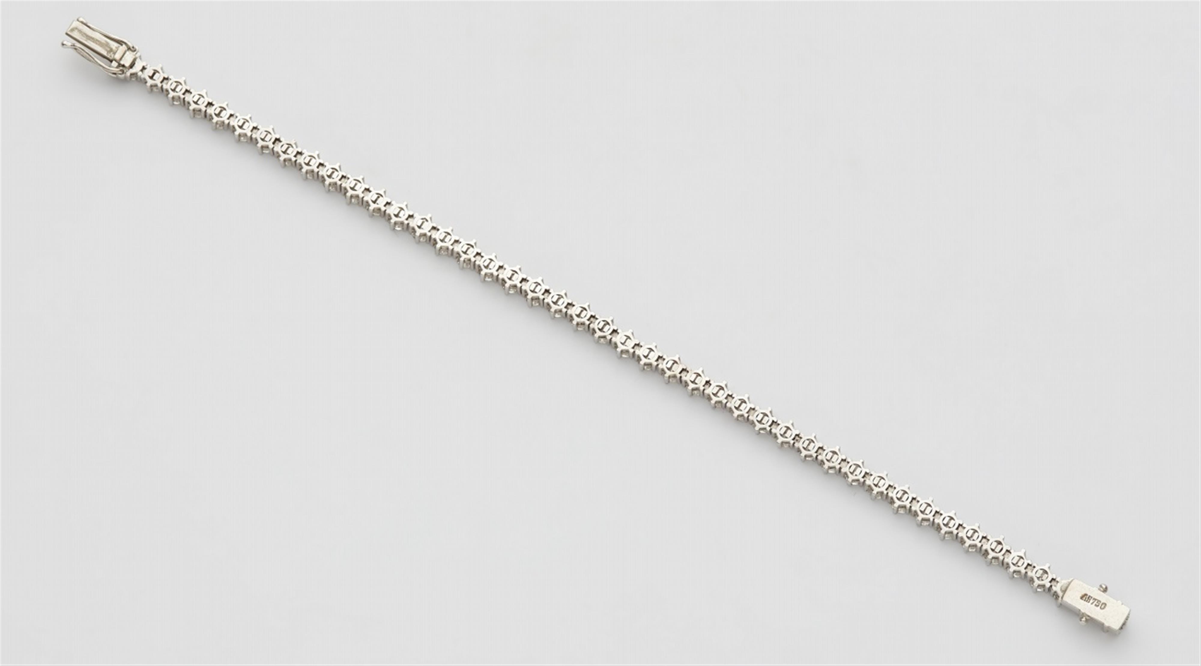 An 18k white gold and diamond rivière bracelet - image-2