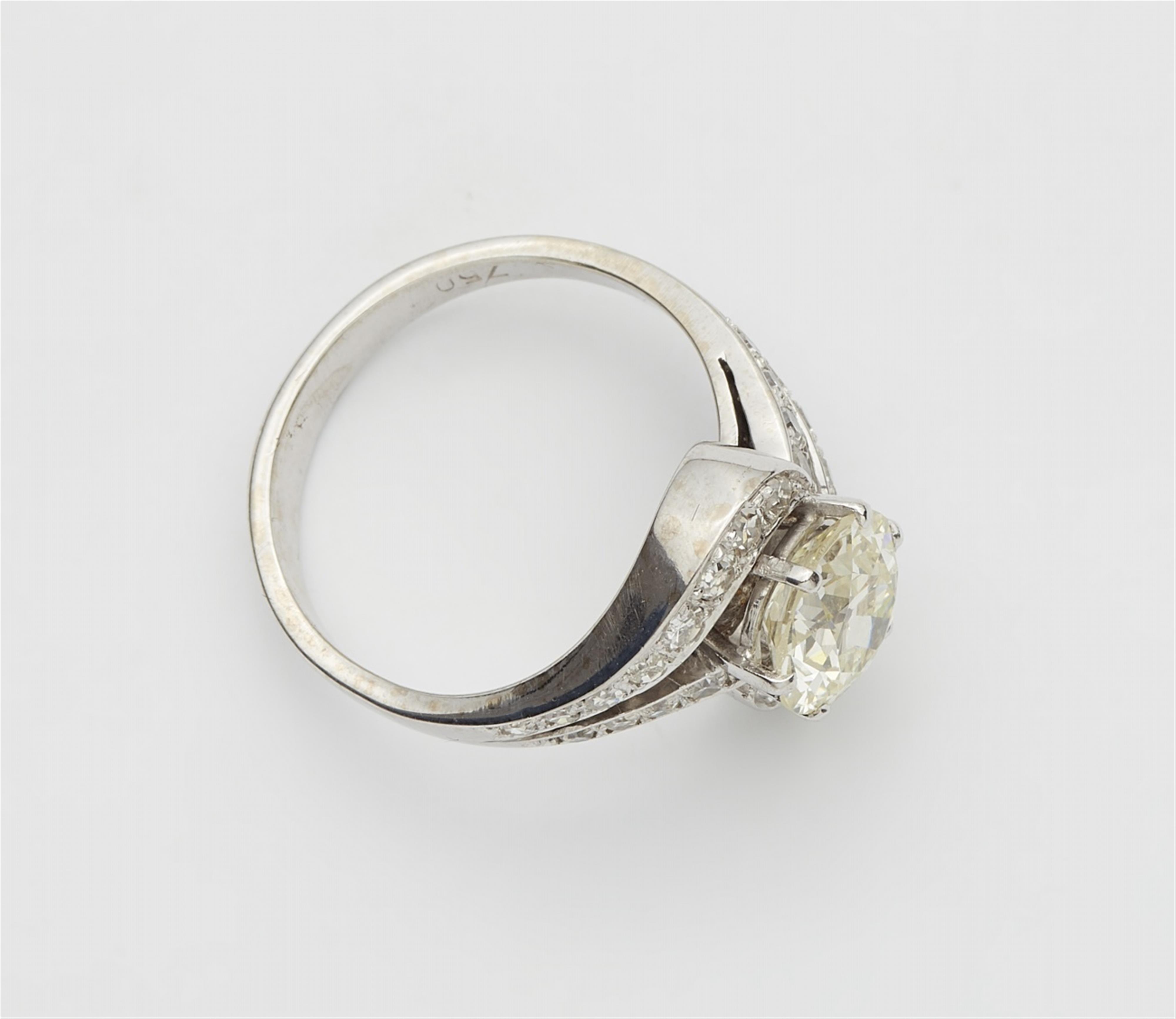 An 18k white gold diamond solitaire ring - image-2