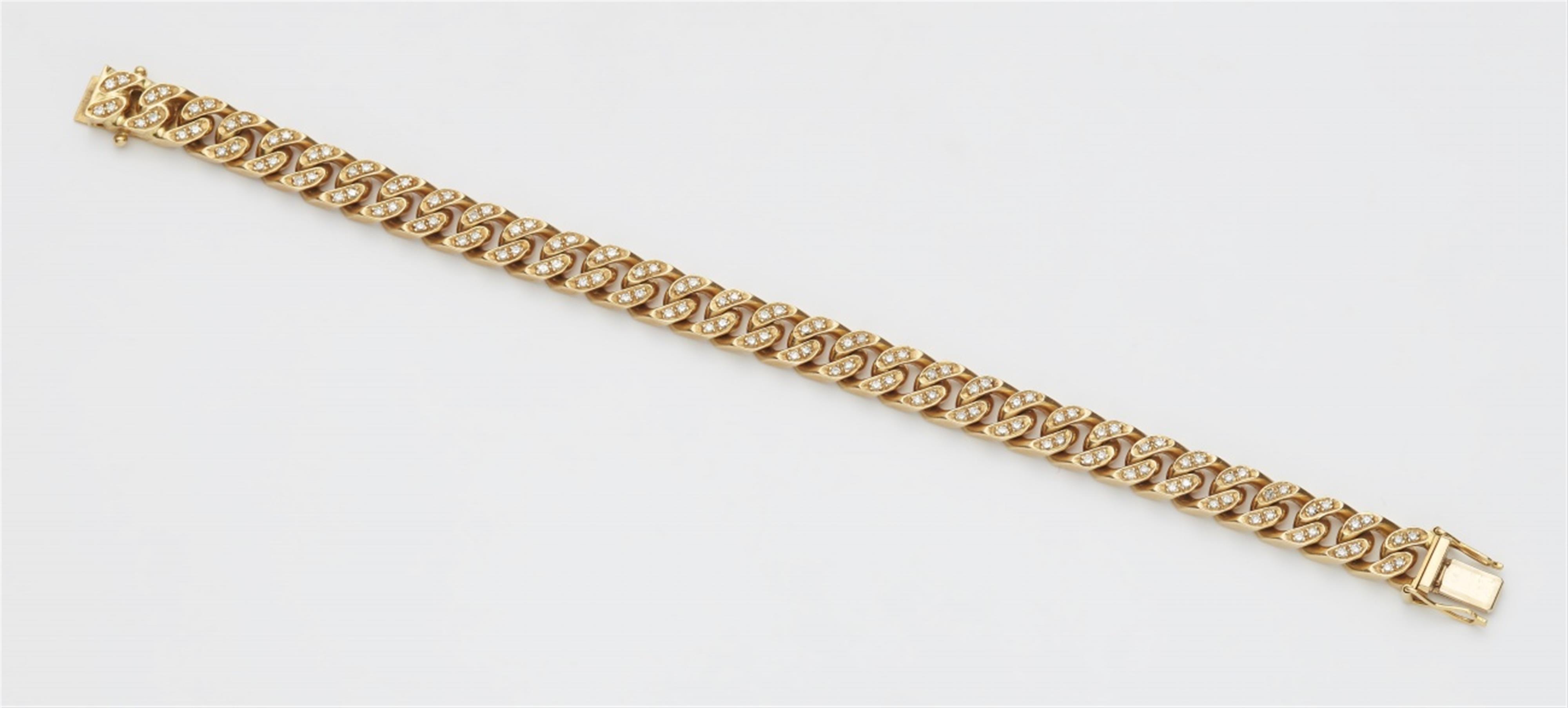 An 18k gold and diamond chain bracelet - image-1