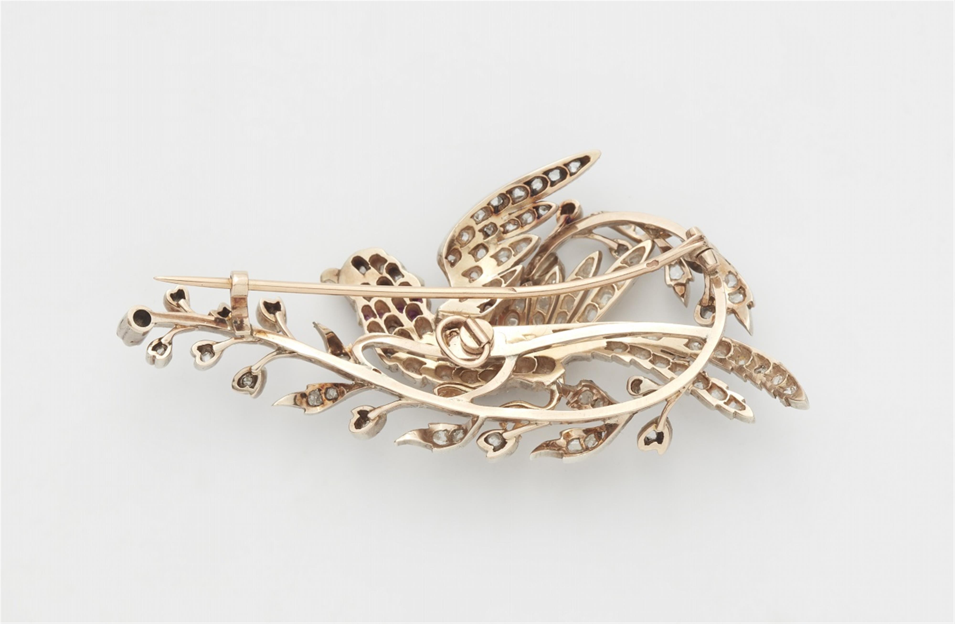 An 18k red gold, ruby, and diamond bird brooch - image-3