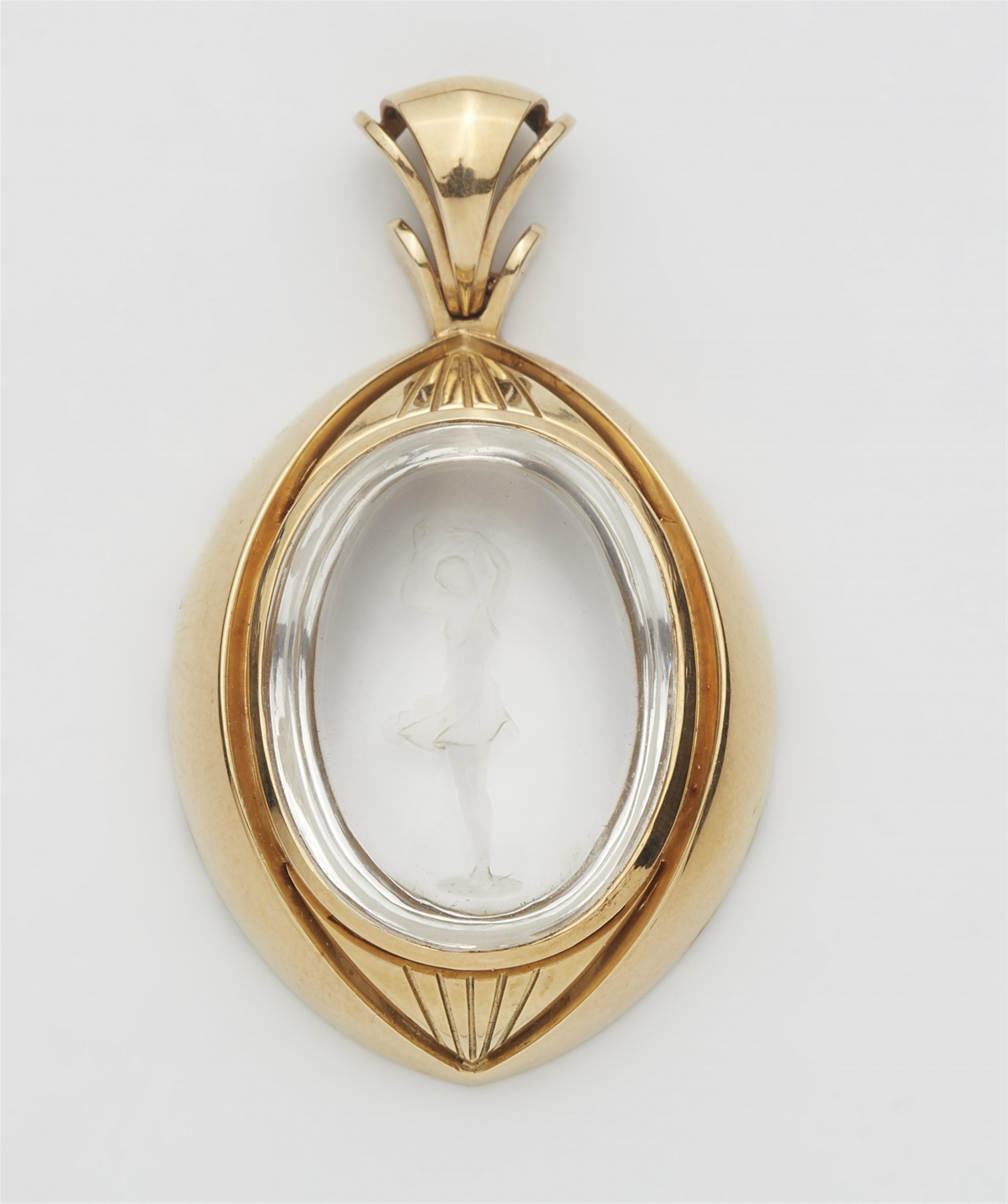 A 14k gold mounted rock crystal intaglio - image-1