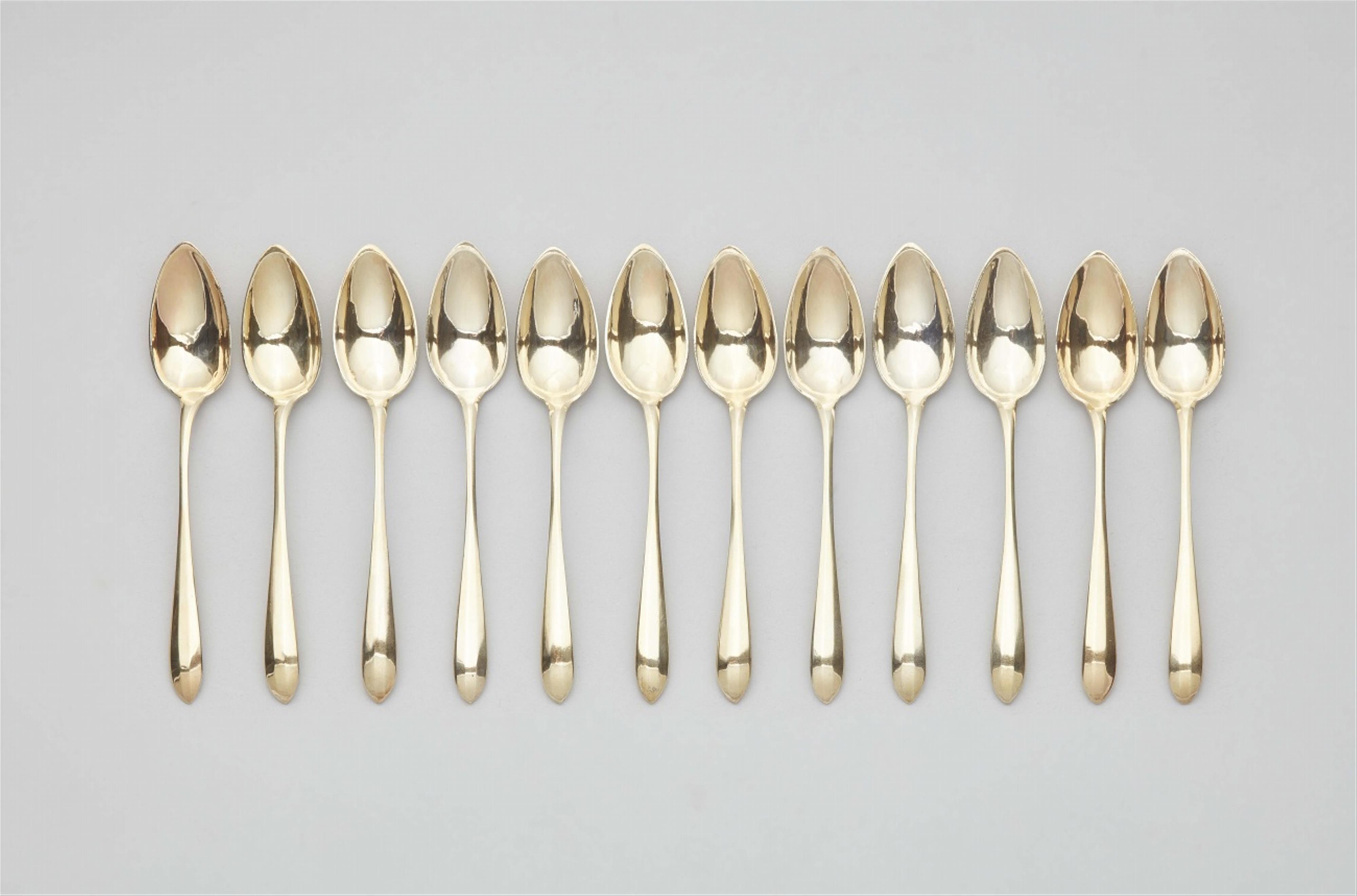 A set of 12 Augsburg silver gilt coffee spoons - image-1