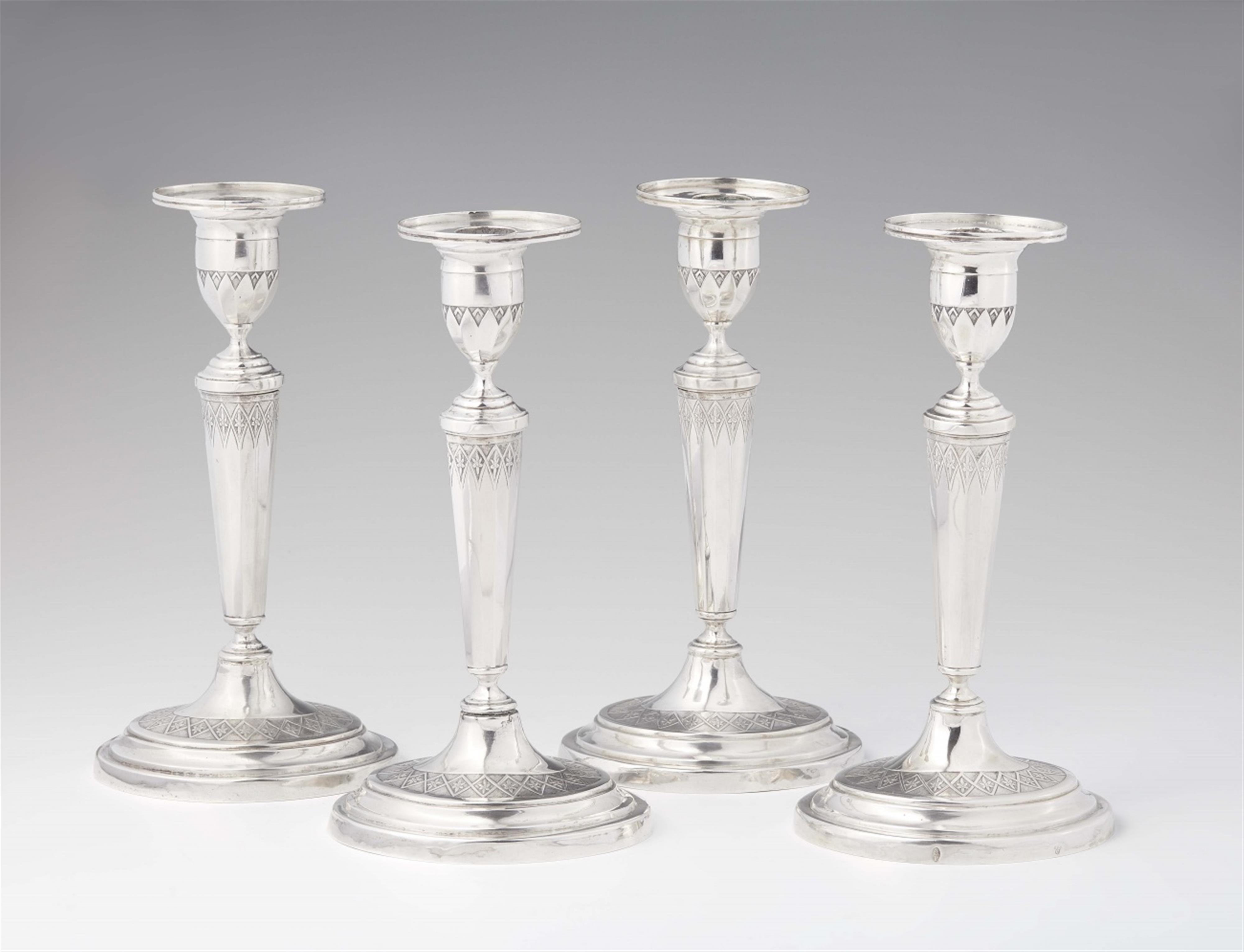 A set of four Augsburg silver candlesticks - image-1