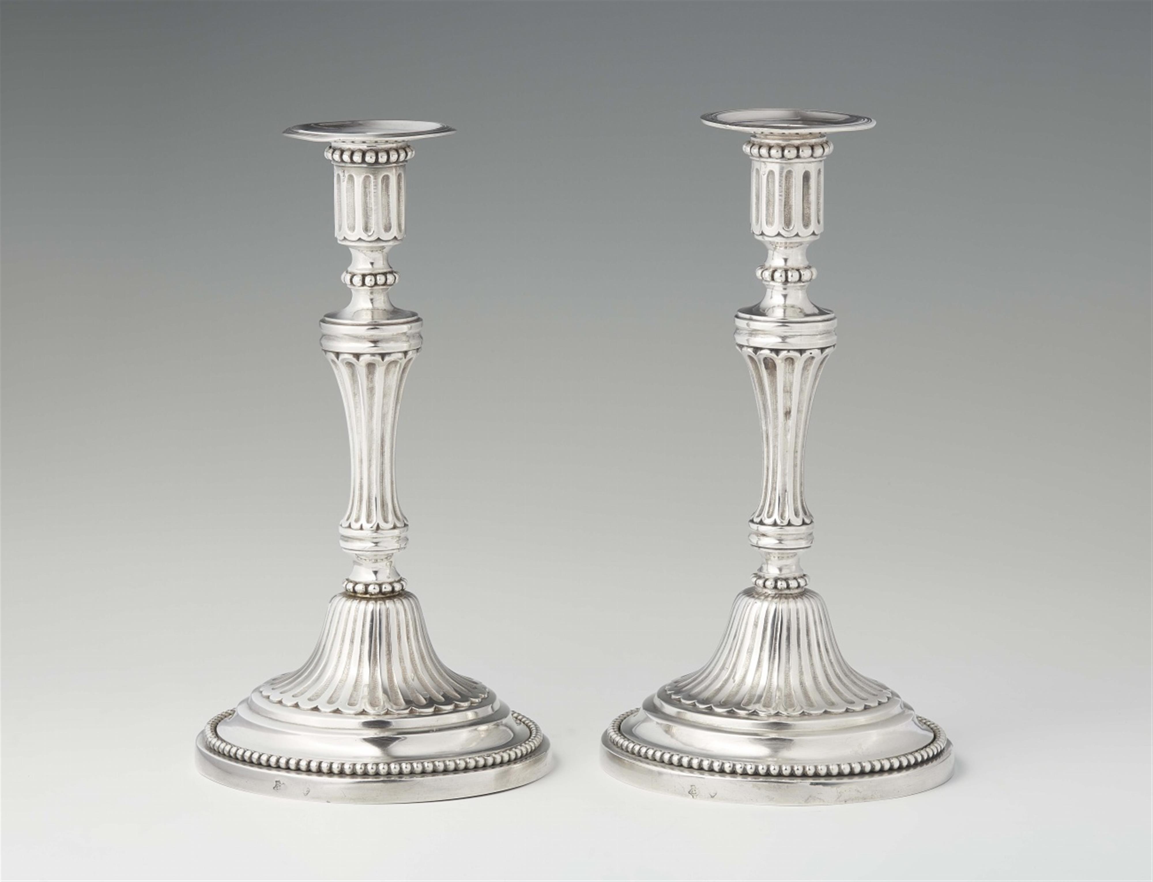 A rare pair of Turin silver candlesticks - image-1