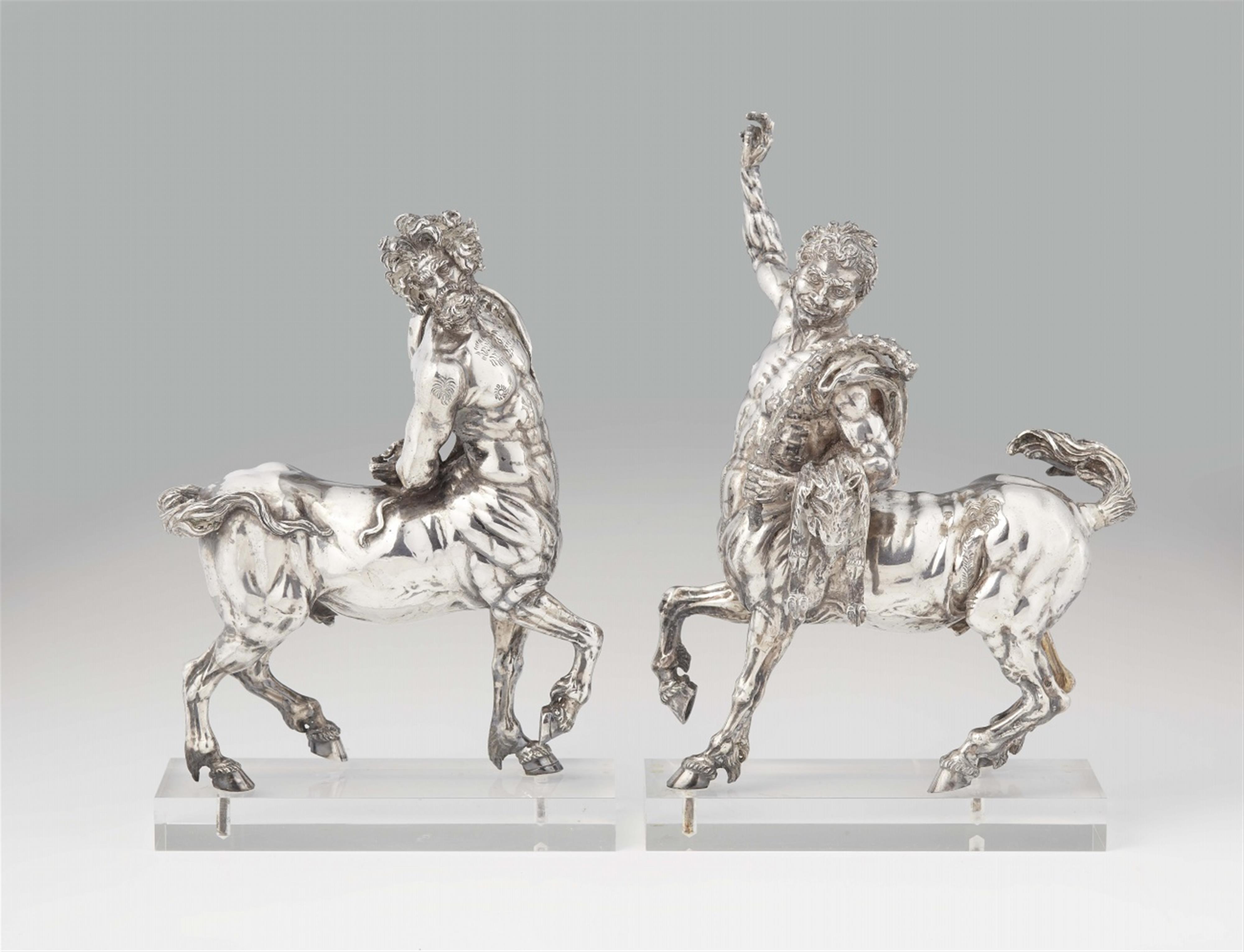 A pair of silver plated metal models of centaurs - image-1